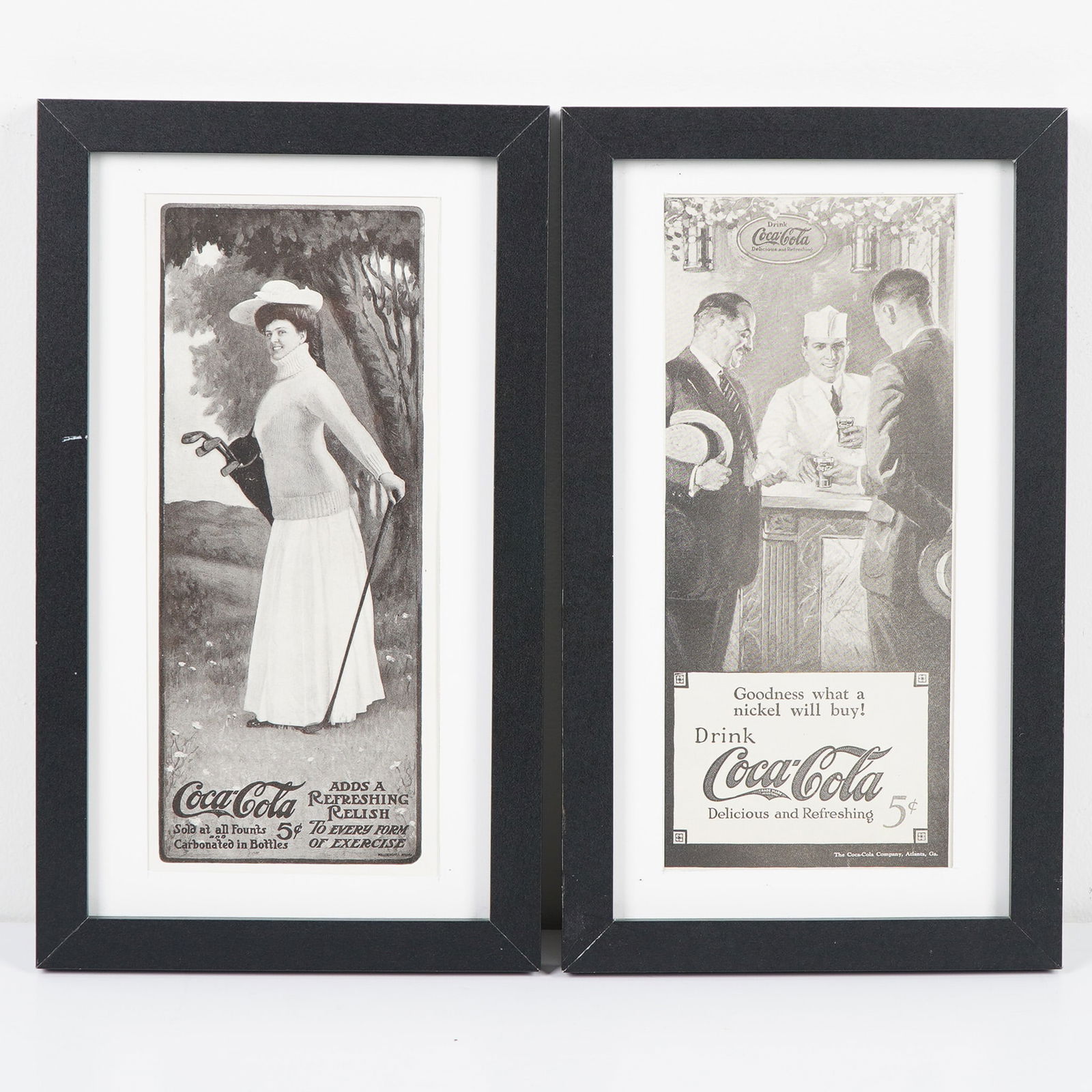 2pc Coca-Cola Framed Prints, Vintage Advertising: Pair of framed Coca-Cola advertising prints featuring early 20th-century illustrations. One depicts a female golfer promoting Coca-Cola as a refreshing addition to every form of exercise; the other sh