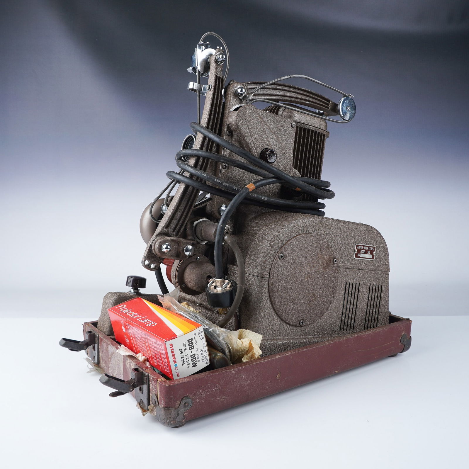 Ampro Super Stylist 8 Projector with Case: Vintage Ampro Super Stylist Model 508 16mm film projector, manufactured by Graflex Inc. of Rochester, NY. This mid-20th-century device features built-in speaker and phono-mic jacks. Includes its origi