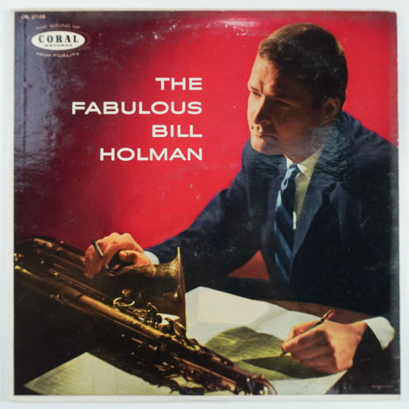 Bill Holman, The Fabulous Bill Holman Vinyl Record: Original 1958 pressing of The Fabulous Bill Holman on Coral Records (CRL 57188). This jazz album showcases Bill Holman's exceptional arrangements and tenor saxophone performances. The cover sleeve fea