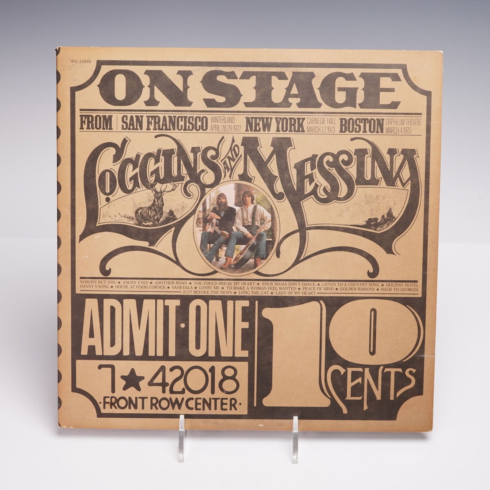 Columbia Records Loggins and Messina 2 Vinyl Records, On Stage: Pair of 12-inch vinyl records titled "On Stage" by Loggins and Messina, released by Columbia Records in 1974. The gatefold album cover is designed to resemble a vintage concert ticket with stylized ty