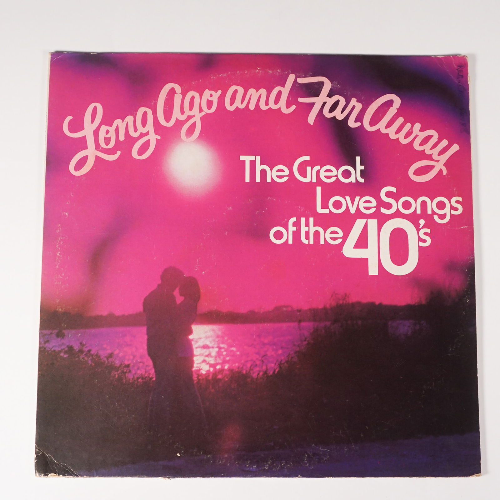 Long Ago and Far Away, The Great Love Songs of the 40's, Vinyl Record: A classic 2-LP set titled Long Ago and Far Away: The Great Love Songs of the 40's featuring iconic romantic songs from the era. The set includes the tracks "Harbor Lights" by Sammy Kaye, "Ole Buttermi
