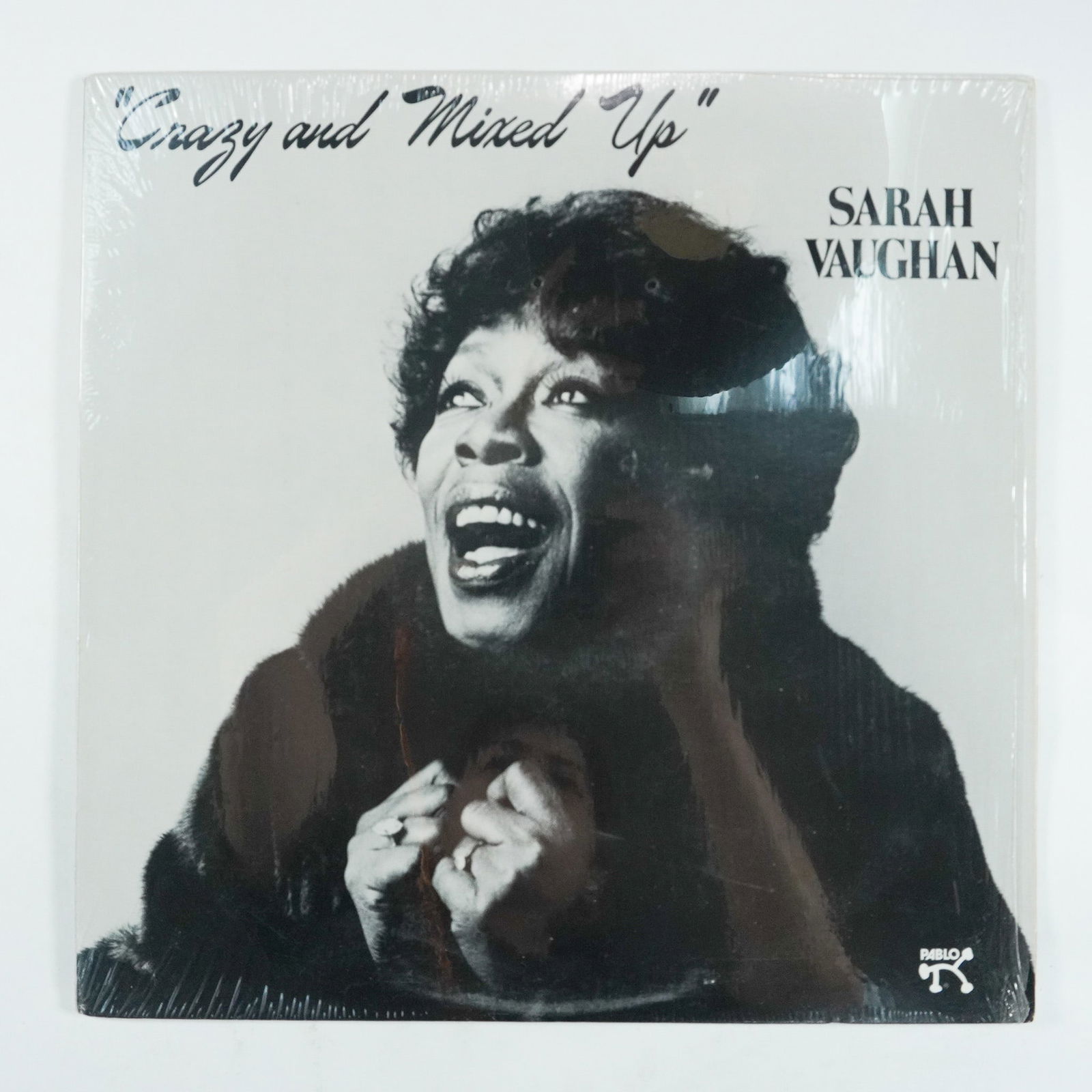 Sarah Vaughan Crazy and Mixed Up Vinyl LP, Pablo Records: This 1982 original pressing of Crazy and Mixed Up by Sarah Vaughan, released on Pablo Records (2312-137), showcases the legendary jazz vocalist's exceptional artistry. Featuring classics such as "I Di