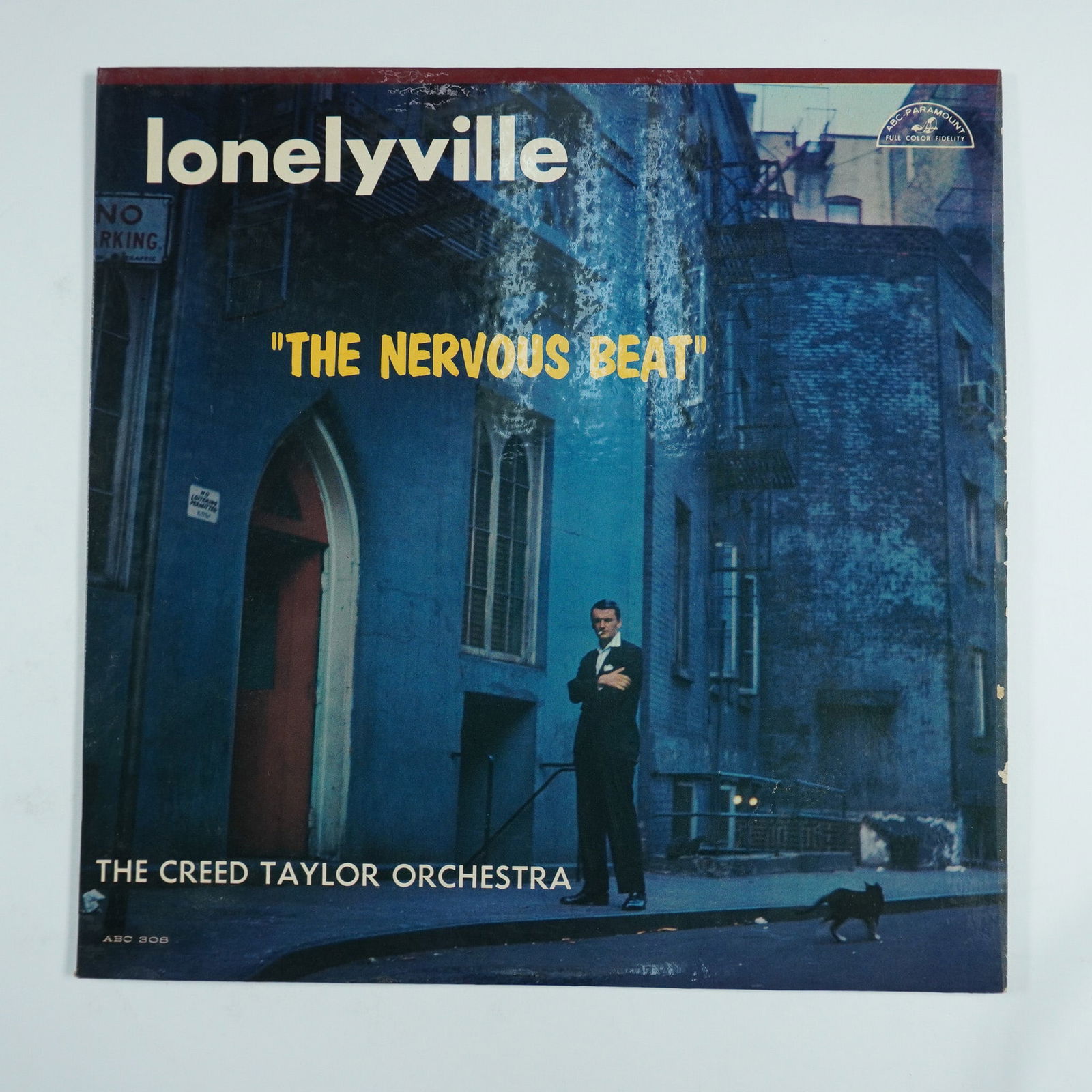 The Creed Taylor Orchestra, Lonelyville The Nervous Beat: This vintage vinyl record, Lonelyville - The Nervous Beat, features The Creed Taylor Orchestra and was released under ABC-Paramount (ABC-308). The album showcases jazz and big band influences with arr