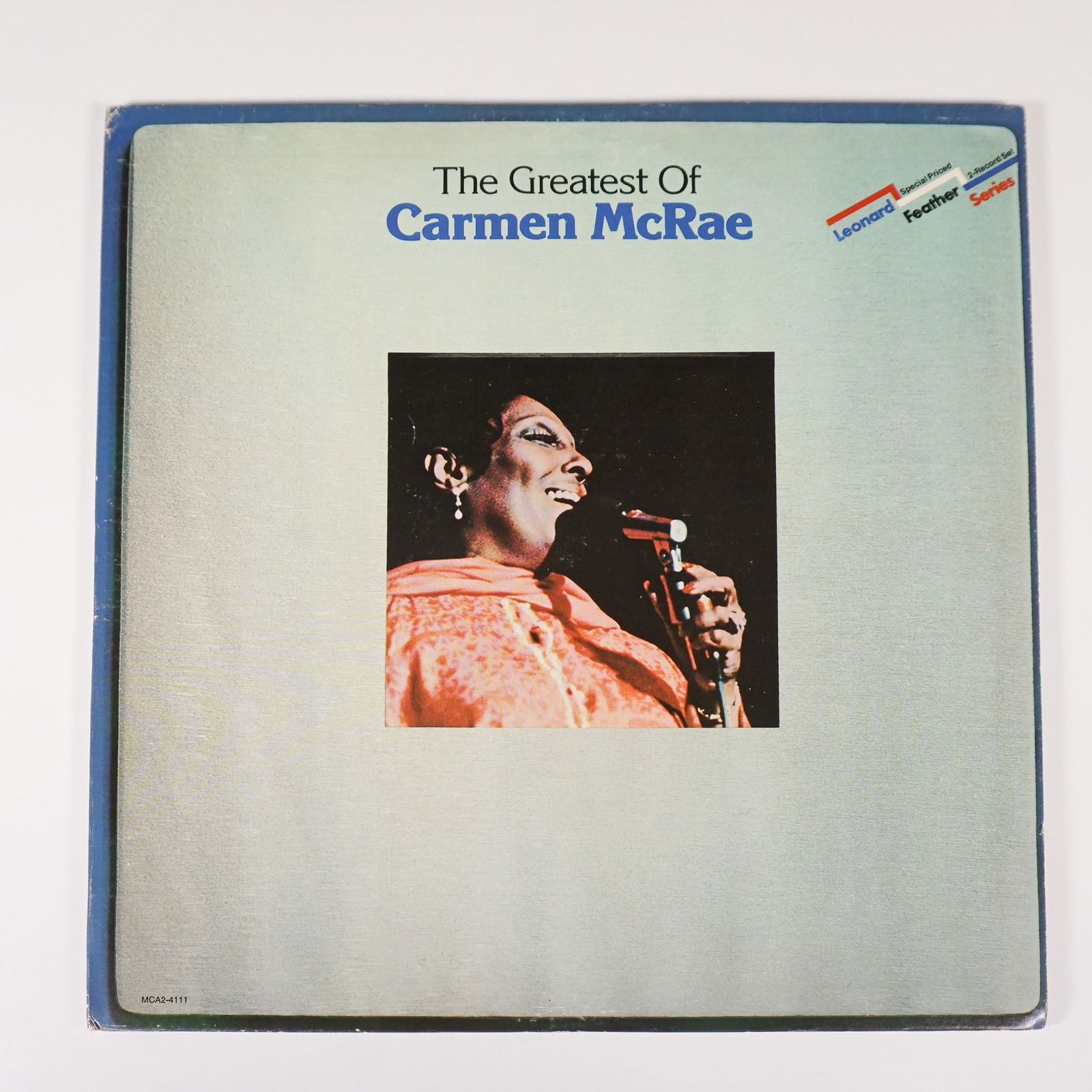 The Greatest of Carmen McRae, Vinyl Record Album, MCA Records: This lot includes two vinyl records albums of The Greatest of Carmen McRae on MCA Records (MCA2-4111). The album features a collection of classic jazz tracks by the iconic singer Carmen McRae, includi