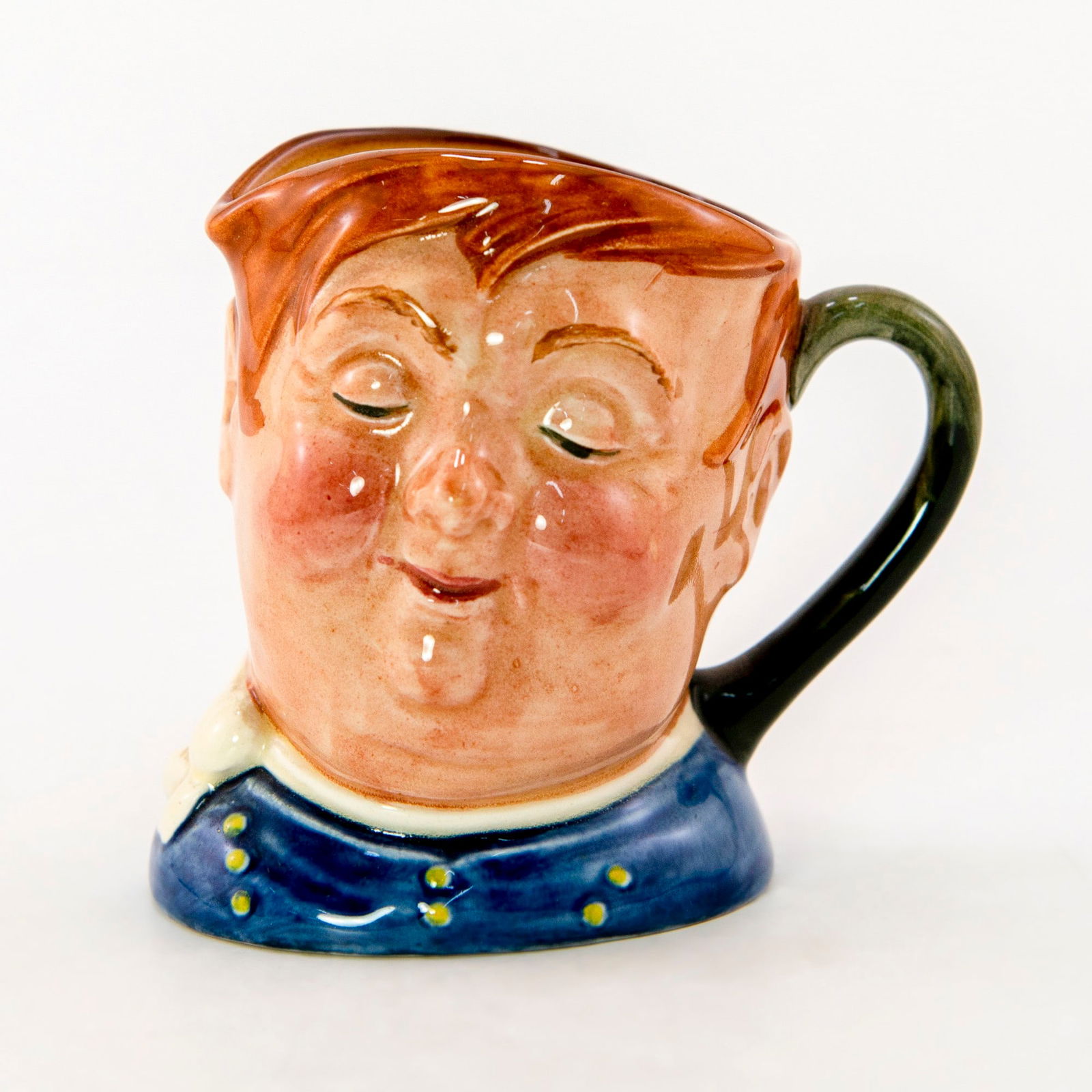 Fat Boy D5840 - Small - Royal Doulton Character Jug: Blue shirt and white scarf. Royal Doulton backstamp. Character from Charles Dicken's The Pickwick Papers. Artist: Leslie Harradine and Harry Fenton Issued: 1948 - 1960 Dimensions: 3.25"H Country of Or