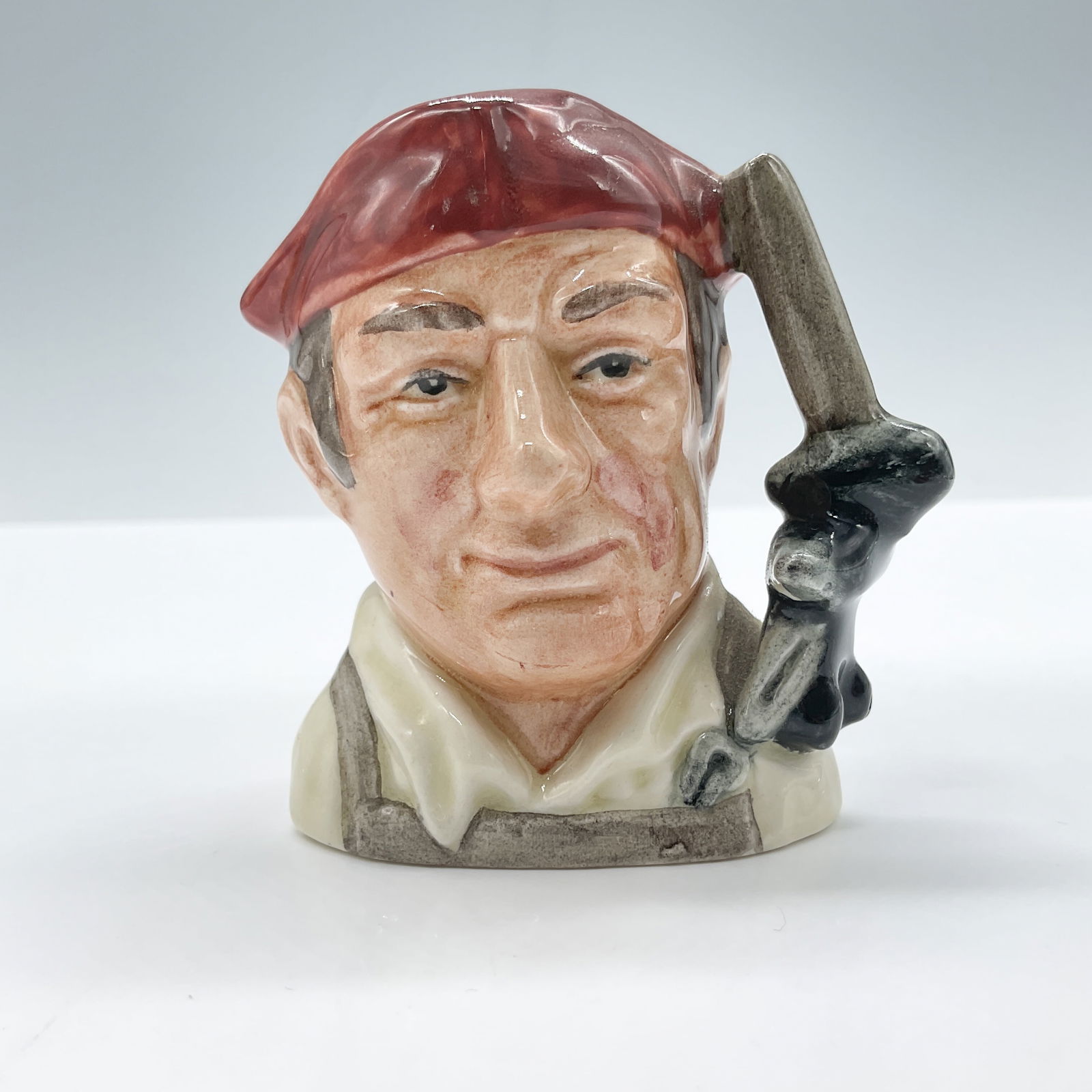 Blacksmith D6585 - Mini - Royal Doulton Character Jug: Royal Doulton backstamp. Artist: David B. Biggs Issued: 1963 - 1983 Dimensions: 2.5"H Country of Origin: England