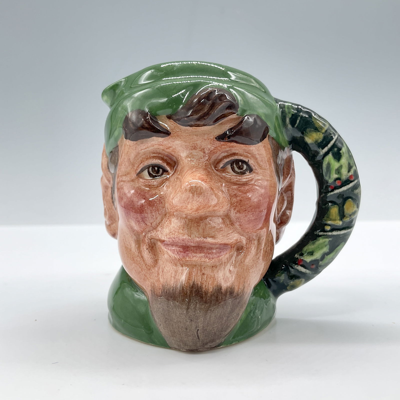 Elf D6942 - Mini - Royal Doulton Character Jug: Royal Doulton backstamp. Artist: William K. Harper Issued: 1993 - 1993 Dimensions: 2.75"H Country of Origin: England