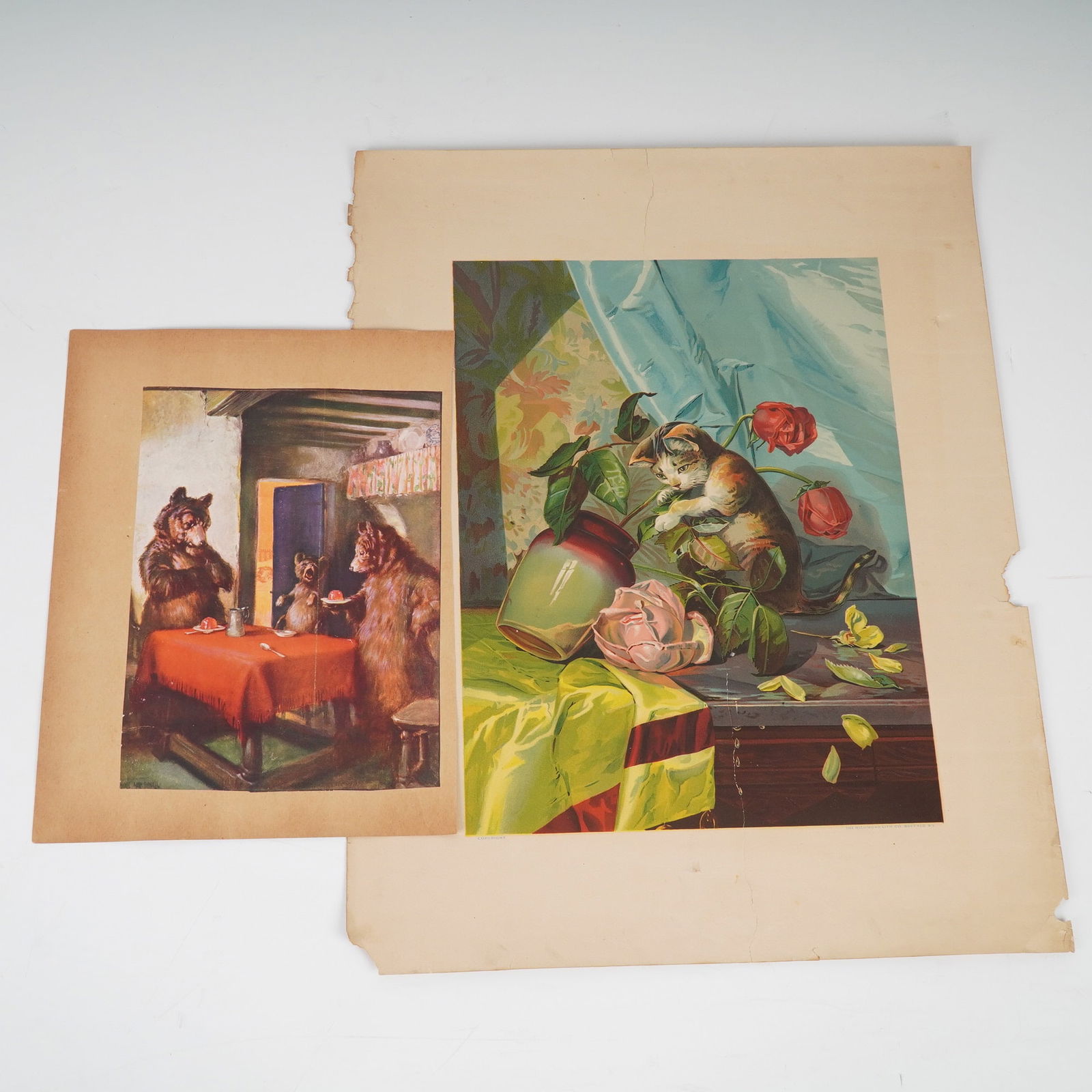 2pc Vintage Nursery and Animal Prints, The Three Bears and Kitten with Rose: Set of two vintage prints, including a vibrant chromolithograph of a curious kitten among toppled roses and a tipped vase on a colorful draped table, and a classic storybook illustration of the Three