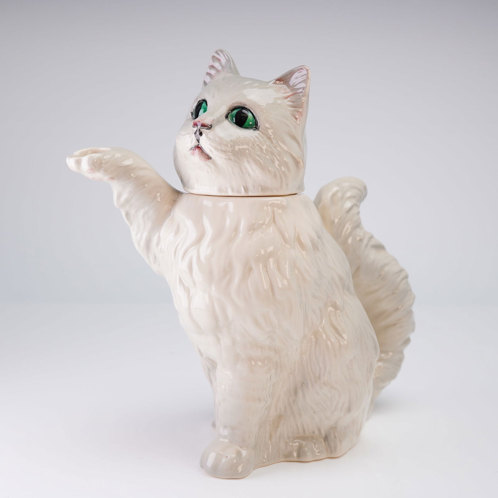 Beswick White Persian Cat Novelty Teapot: A figural ceramic novelty teapot manufactured by Beswick, England, modeled as a seated long-haired cat, identified in the market as the Persian Cat Teapot. The earthenware body is finished with a glos