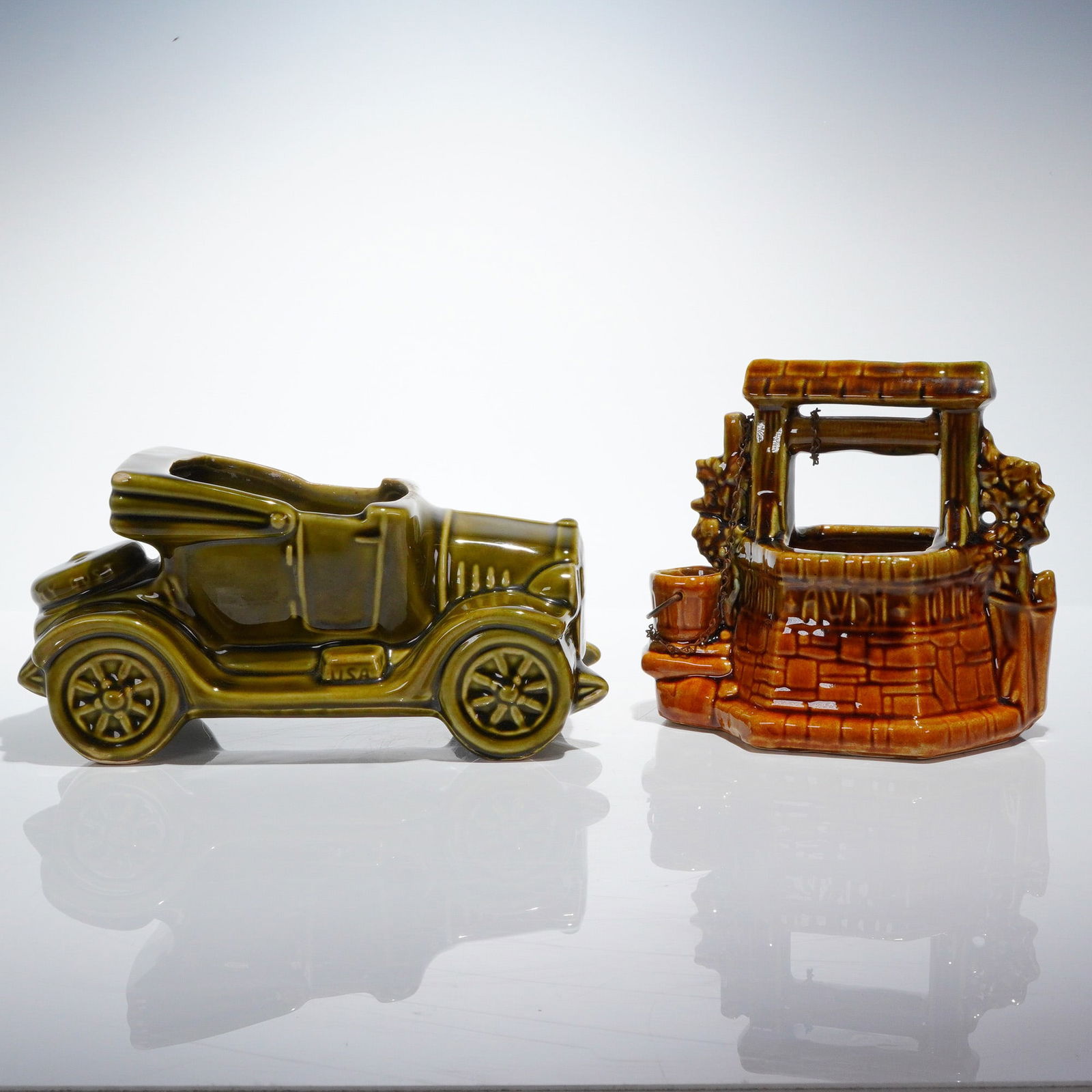 A Pair of McCoy Pottery Decorative Car and Wishing Well Planters (1 of 6)
