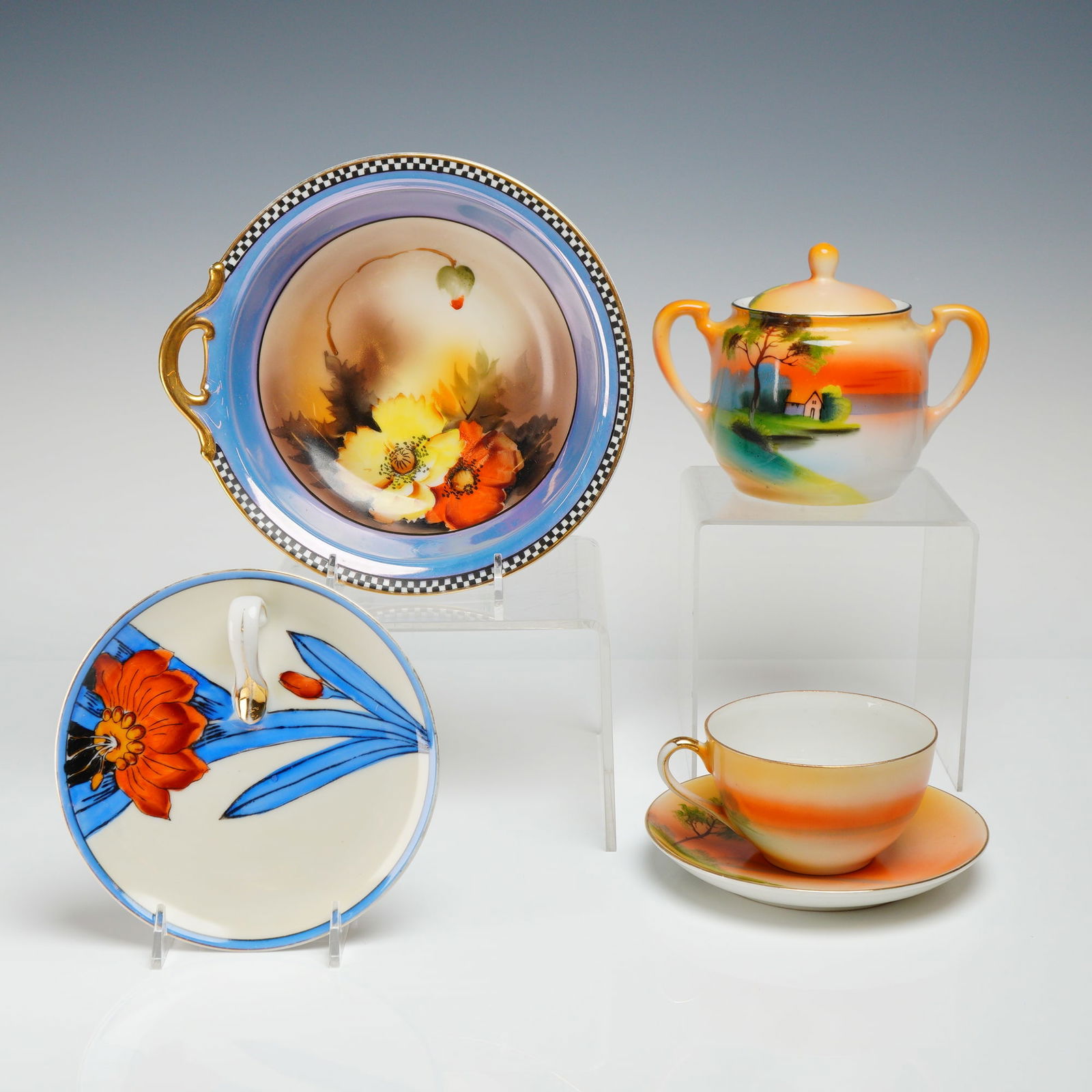 5pc Noritake Lusterware Dishes - Sugar Bowl with Lid, Plate: The collection includes a lidded sugar bowl (two pieces), one teacup, one saucer, one large handled circular serving dish, and one small handled circular candy dish. The pieces display two distinct de