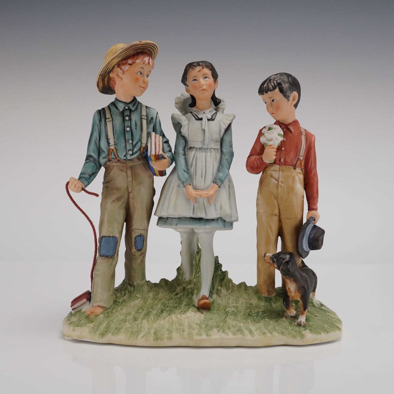 Gorham Norman Rockwell Figurine Spring Young Man's Fancy: A figurative sculpture group by Gorham, inspired by Norman Rockwell's Four Seasons Illustrations for 1954 Spring, titled "Young Man's Fancy." The piece is crafted from glazed and hand-painted ceramic
