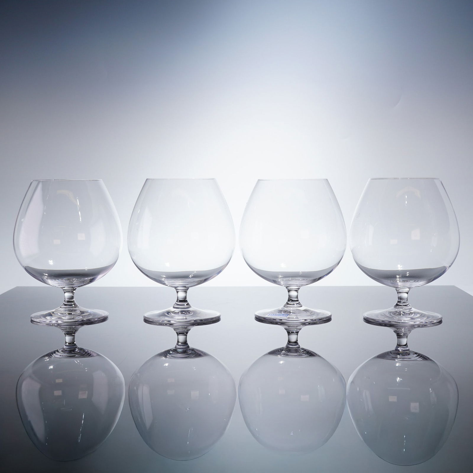 2 Sets of Marquis by Waterford Vintage Crystal Brandy Snifters: Part of the Vintage Tasting Collection line, each glass is characterized by the traditional large balloon bowl shape, designed for brandy or cognac, supported by a short stem and a wide, circular foot