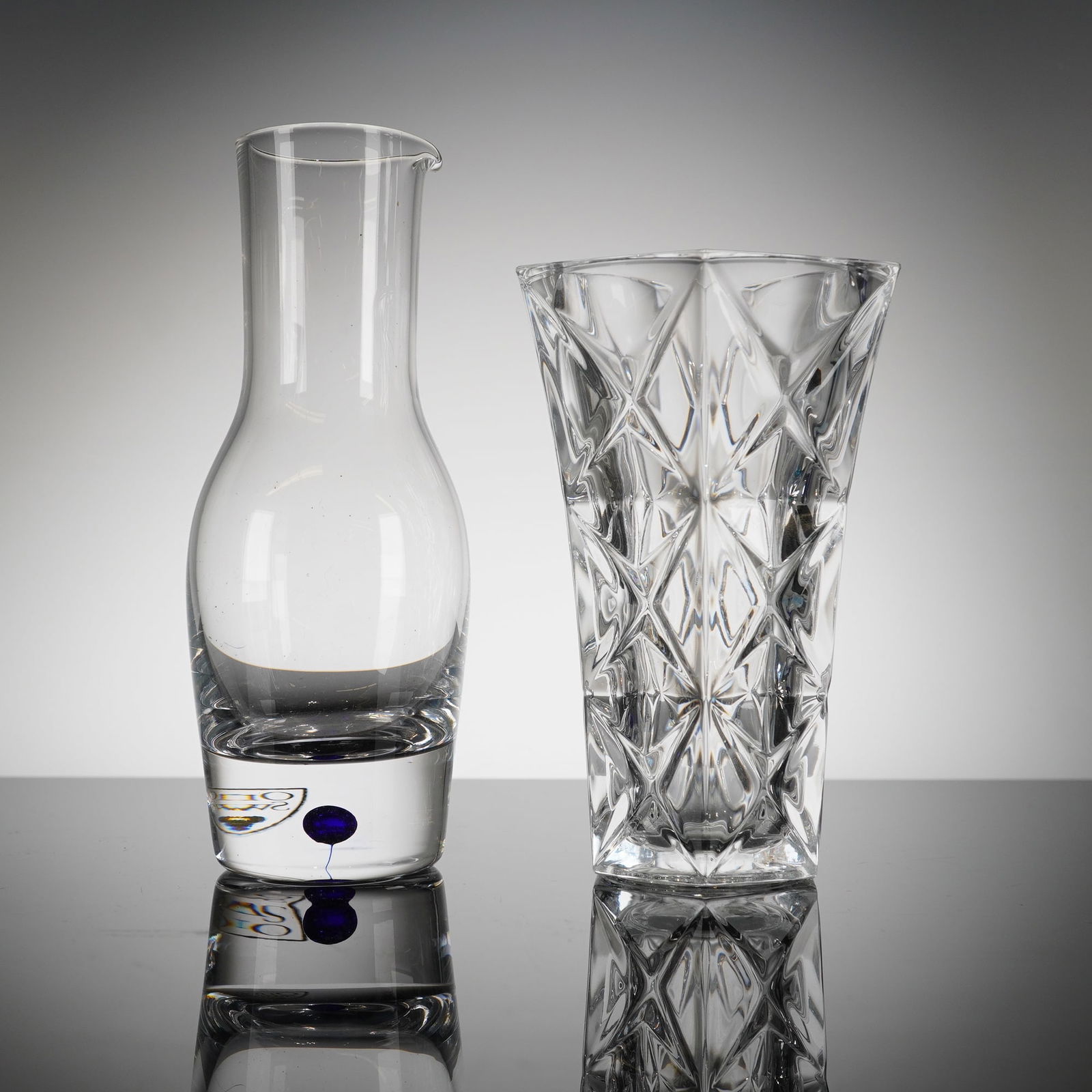 A Two-Piece Orrefors Crystal Pitcher and Vase (1 of 4)