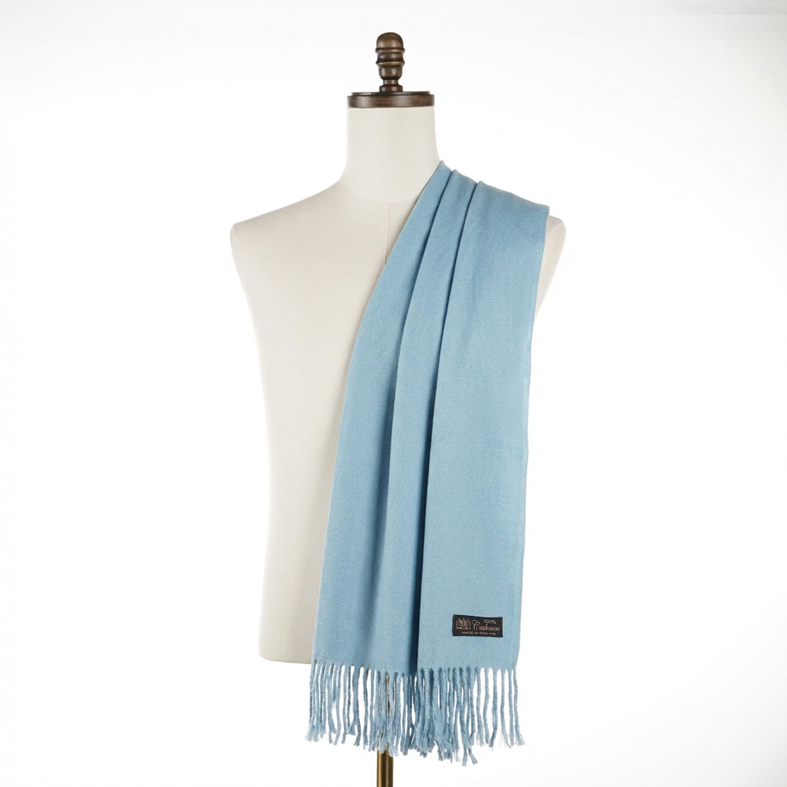 Cashmere Baby Blue Oversize Scarf w/ Fringe Edges, Made in England: Made in England 100% cashmere oversize scarf with fringe edges. This lightweight baby blue color scarf exudes understated luxury. Dimensions: 25.50"W x 70"L Issued: c. 2000 Country of Origin: England