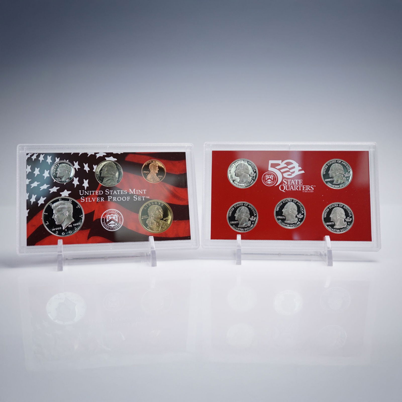 2002-S U.S. Mint Silver Proof Set (10 Coins): 2002 San Francisco-minted proof set, complete with Original Government Packaging and the Mint's certificate of authenticity. One lens holds the cent, nickel, silver Roosevelt dime, silver Kennedy half