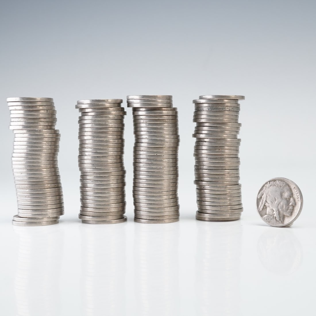 1920s and 1930s Assorted Buffalo Nickels: A collection of Buffalo Nickels from the 1920s and 1930s. The obverse features the composite profile of Iron Tail, Two Moons, and Big Tree, prominent Native American leaders, surrounded by the