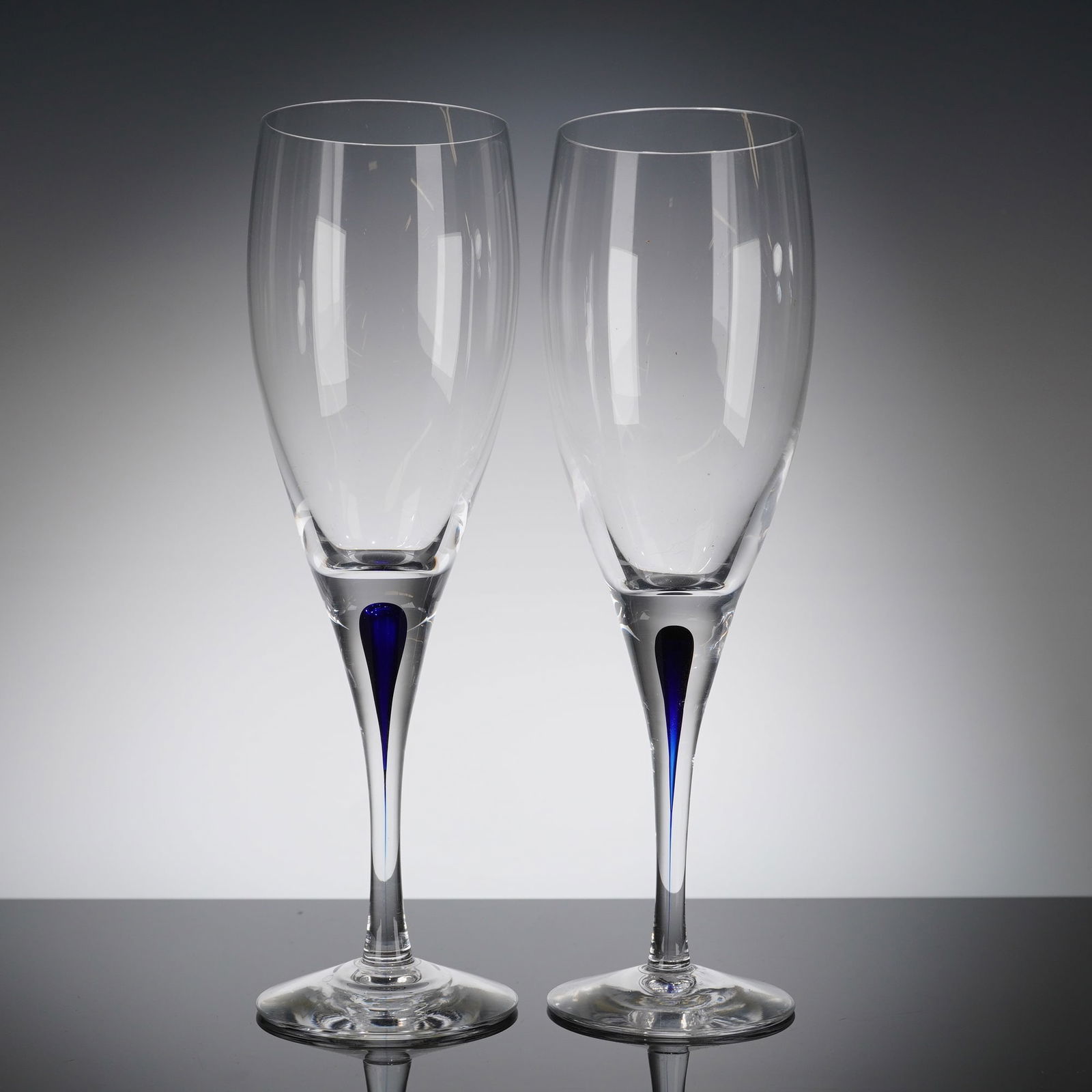 A Pair of Orrefors Intermezzo Blue Crystal Champagne Flutes (1 of 4)
