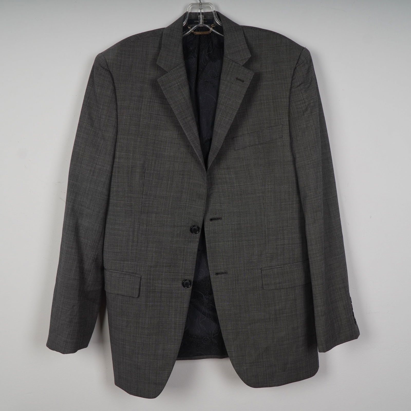 Donald J. Trump Signature Collection Gray Wool Blazer: Gray two-button blazer from the Donald J. Trump Signature Collection, sold through Macy's Men's Store. Made from 100 percent wool with a dark paisley lining. Size 38R. Made in China. Dimensions: Size: