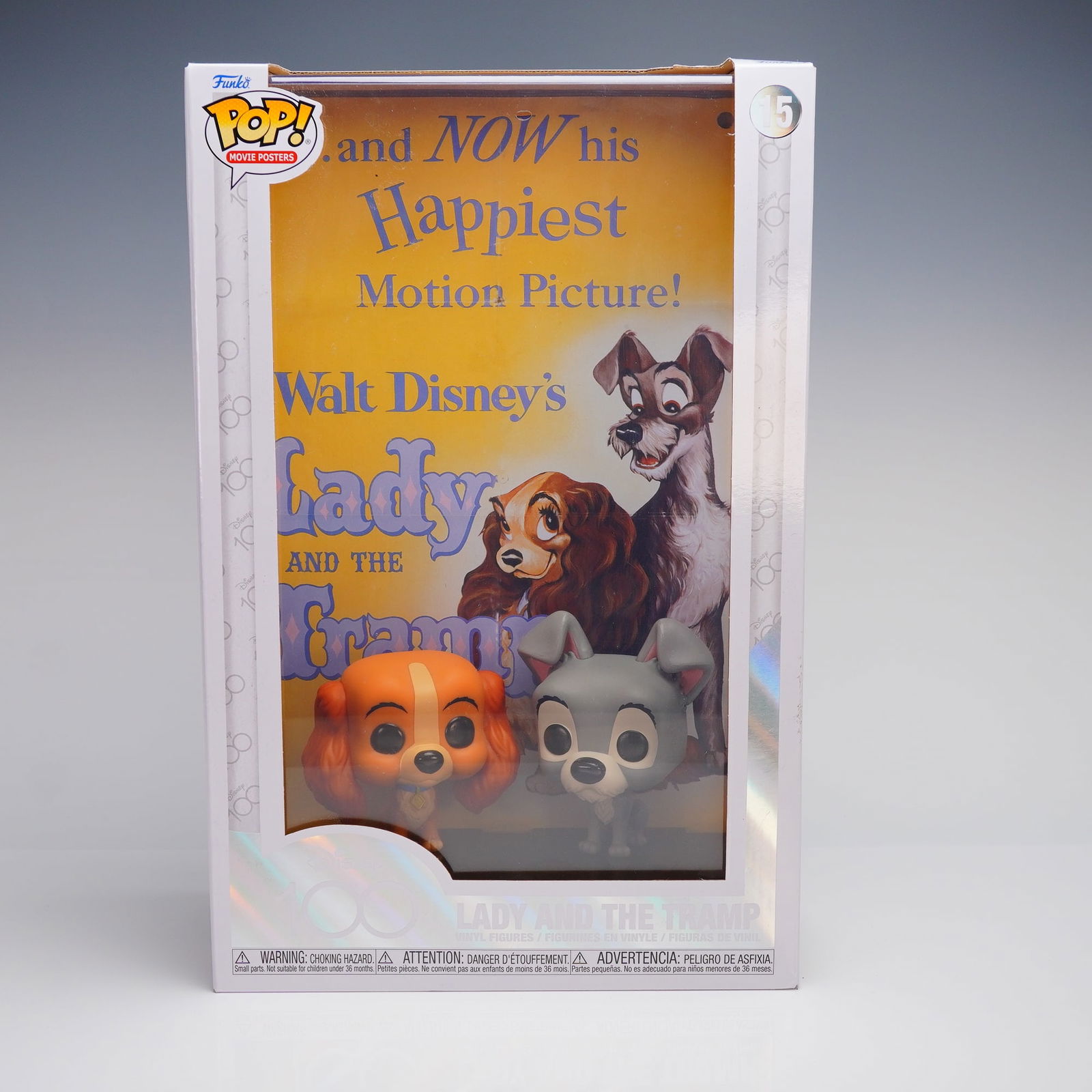 Funko POP! Movie Poster Disney Lady and the Tramp Vinyl Figurines Set: This collectible consists of two stylized vinyl figurines (Lady and Tramp) displayed against a background print replicating the film's original promotional poster art, bearing the text "...and NOW his