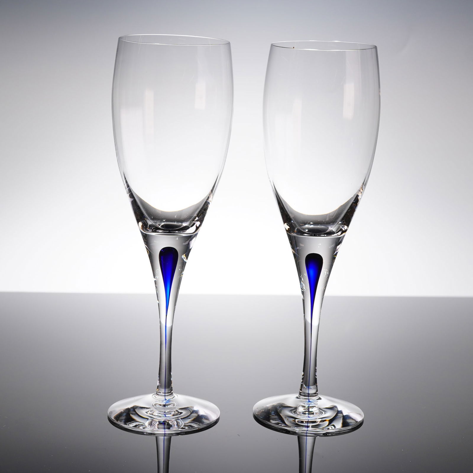A Pair of Orrefors Intermezzo Blue Crystal Flutes (1 of 4)