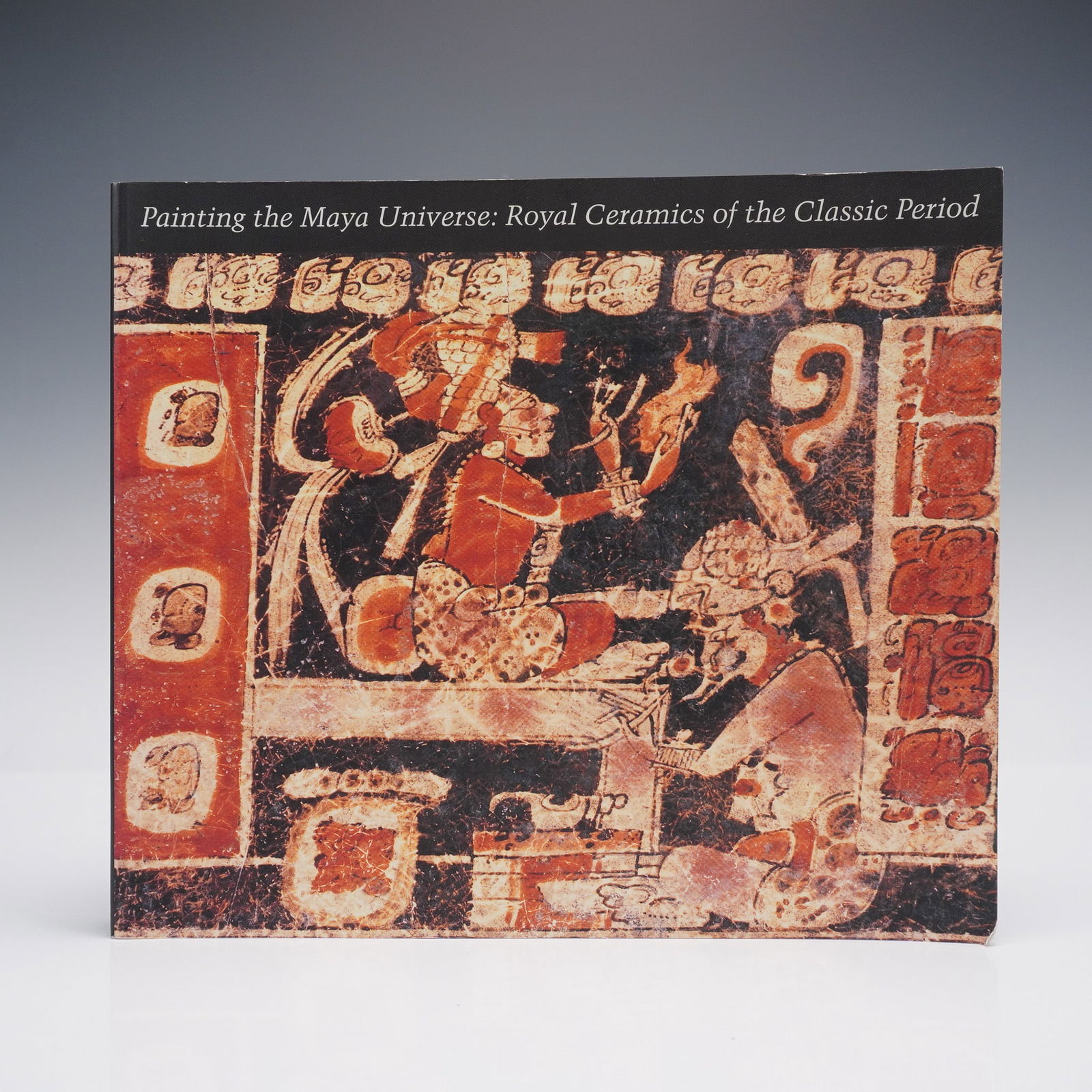 Dorie Reents-Budet Softcover Book, Painting the Maya Universe: Durham: Duke University Press, 1994. A visually rich and scholarly exploration of royal ceramics from the Classic Maya period. This publication accompanied the multi-venue exhibition of the same name