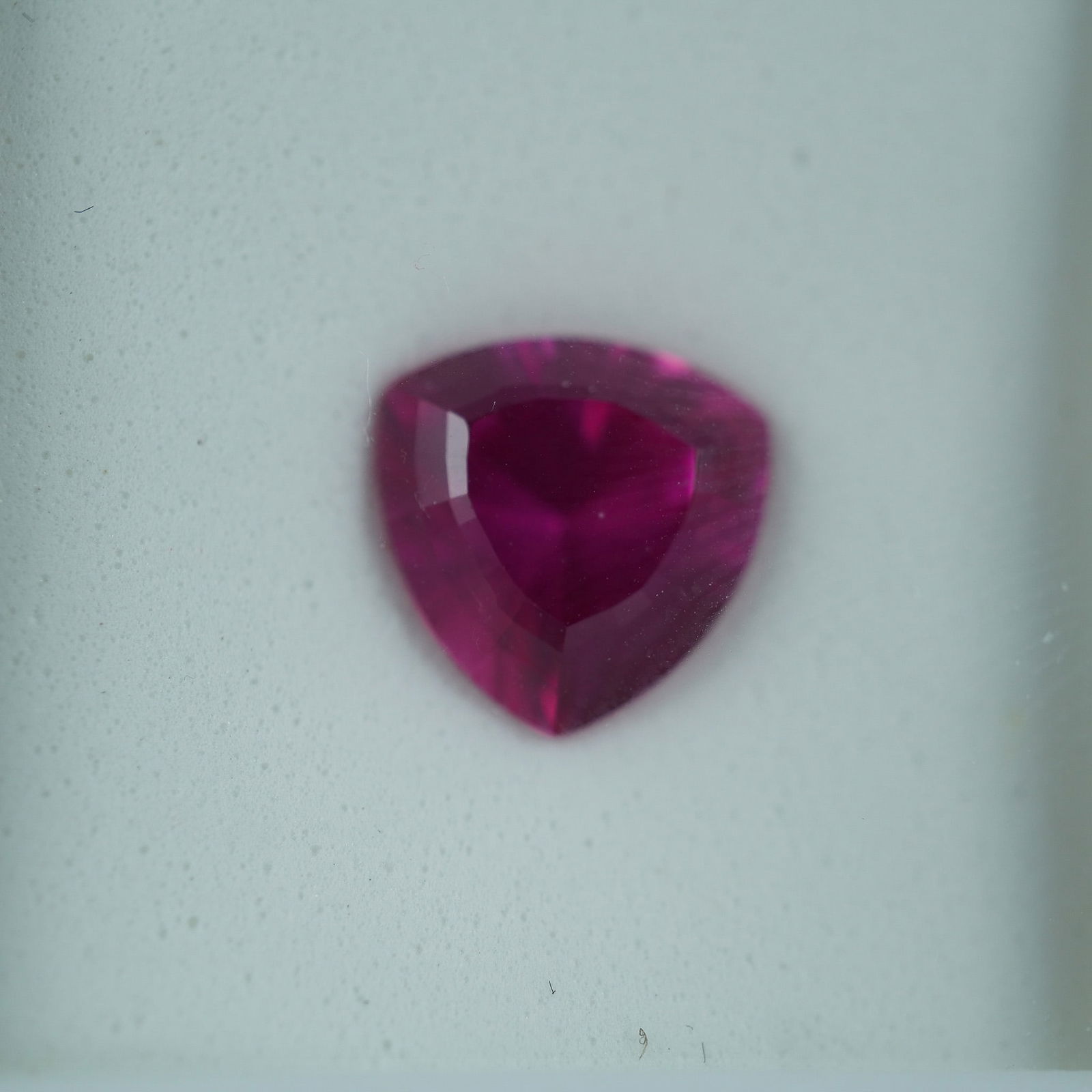 3.50 CT Lab-Created Sapphire Trillion Cut Gemstone: This stunning 3.50-carat lab-created sapphire features a brilliant trillion cut. The gemstone exhibits a vibrant pink hue, with excellent clarity and sparkle. Known for its exceptional color and brill
