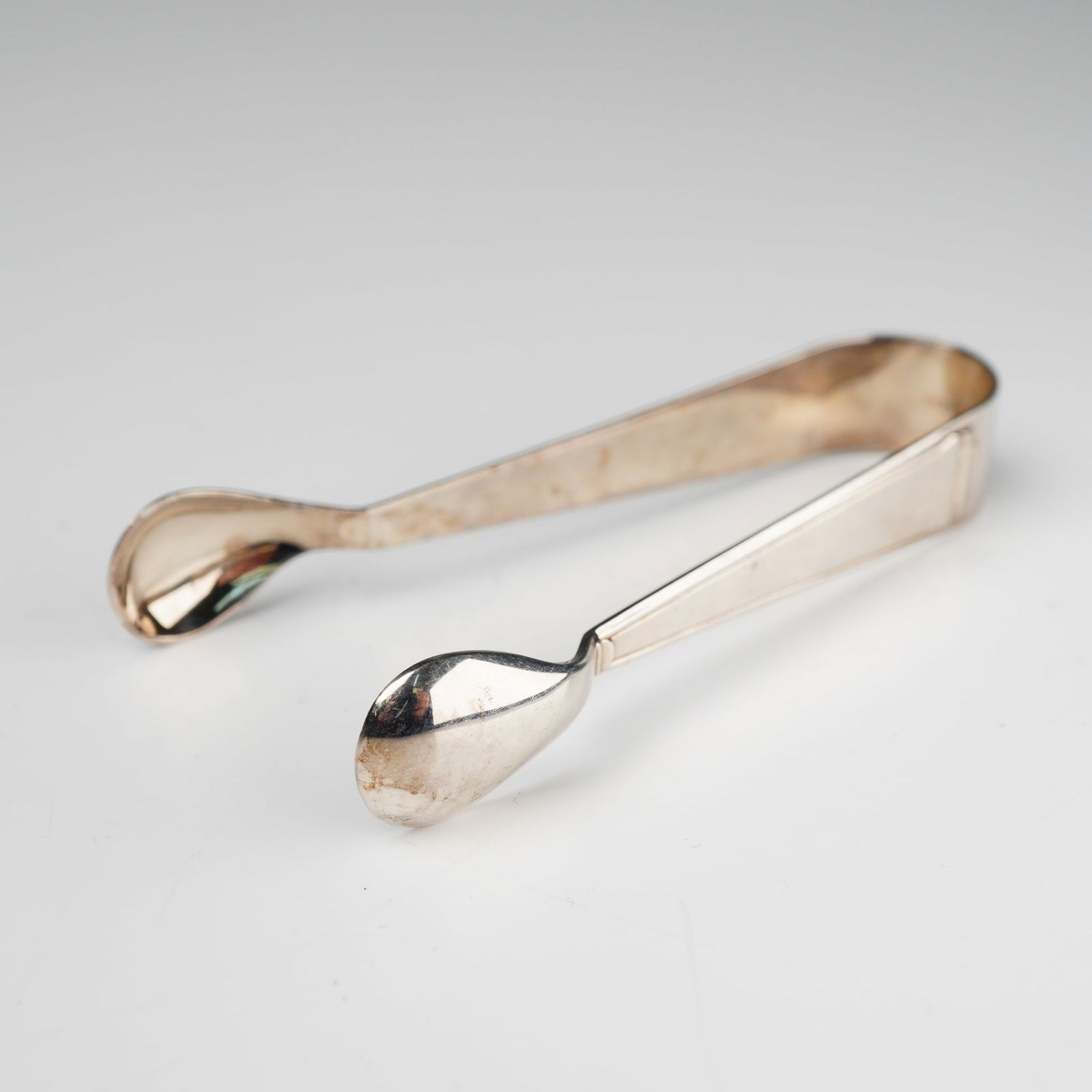 A Pair of Silver Plate Sugar Tongs, Marked R&B (1 of 6)