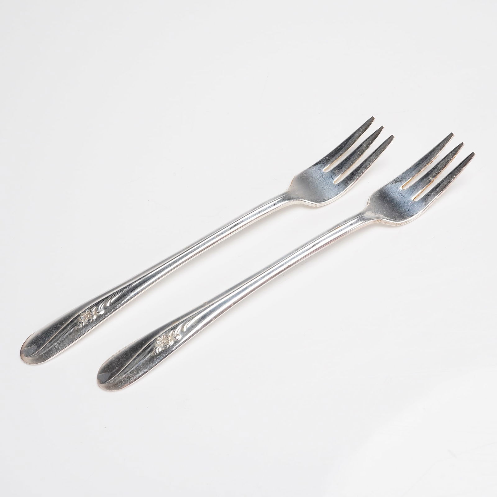 A Pair of Holmes & Tuttle Silverplate Meadow Flower Pattern Forks (1 of 4)