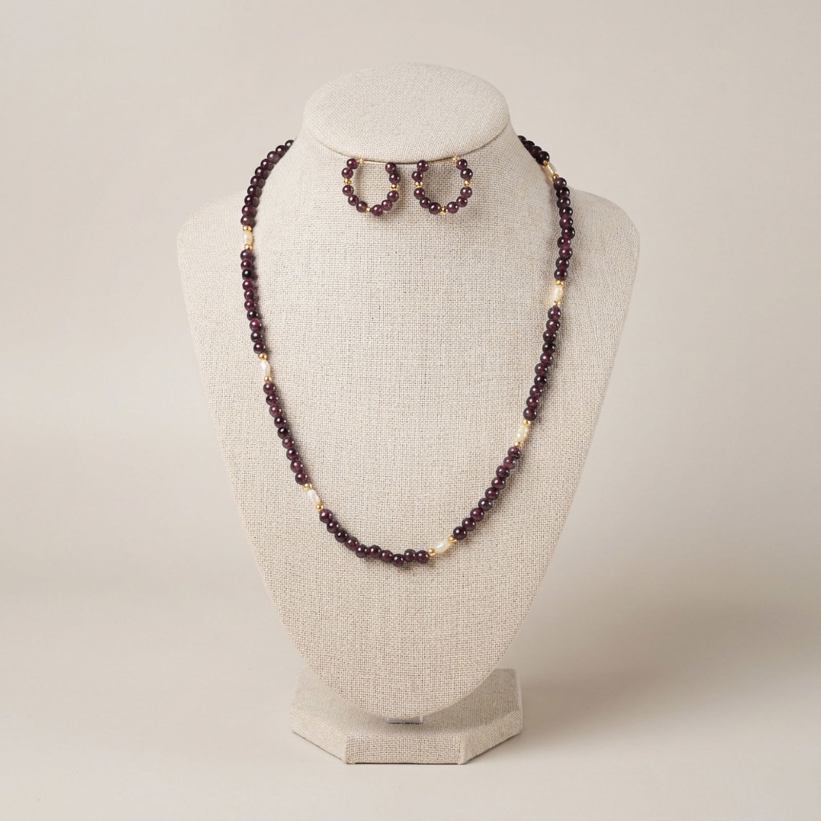 3pc 14K Gold Garnet & Freshwater Pearl Necklace Earring Set: A necklace and a pair of matching hoop earrings constructed of polished spherical garnet, gold bead spacers, and irregularly shaped baroque freshwater pearls. The deep wine-red garnet beads are inters