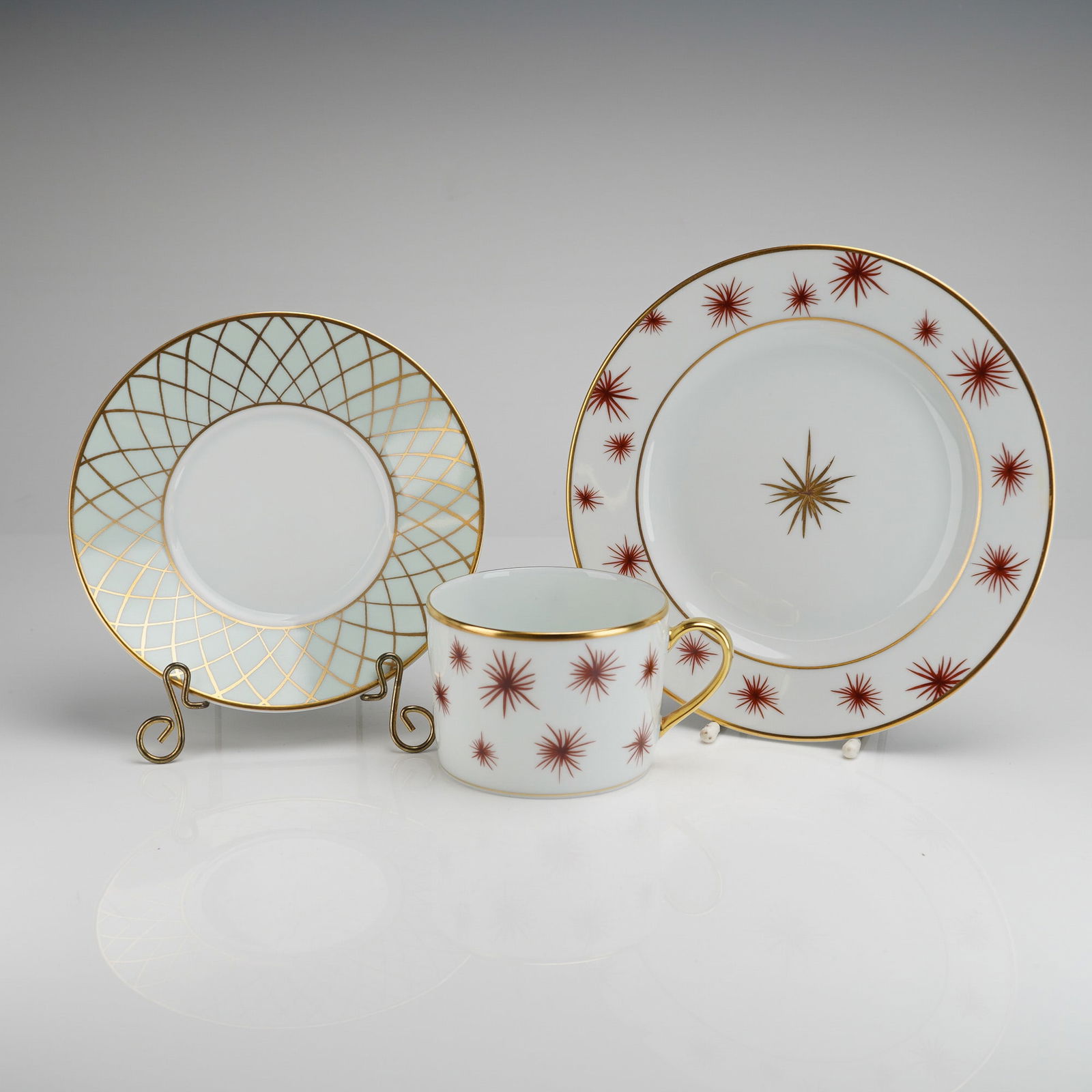 A Trio of Bernardaud Etoile Flat Cup, Saucer, and Plate Set (1 of 5)