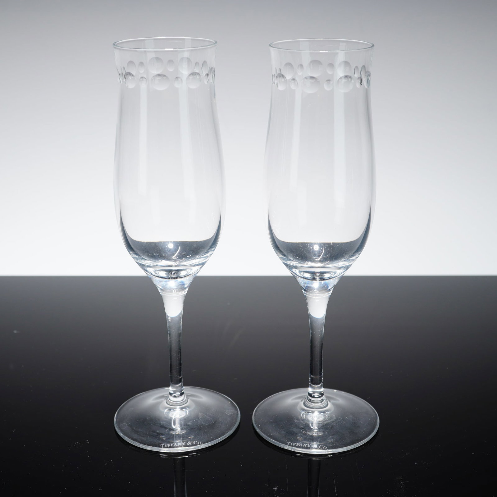 A Pair of Tiffany & Co. Crystal Champagne Flutes in the Bubbles Pattern (1 of 4)