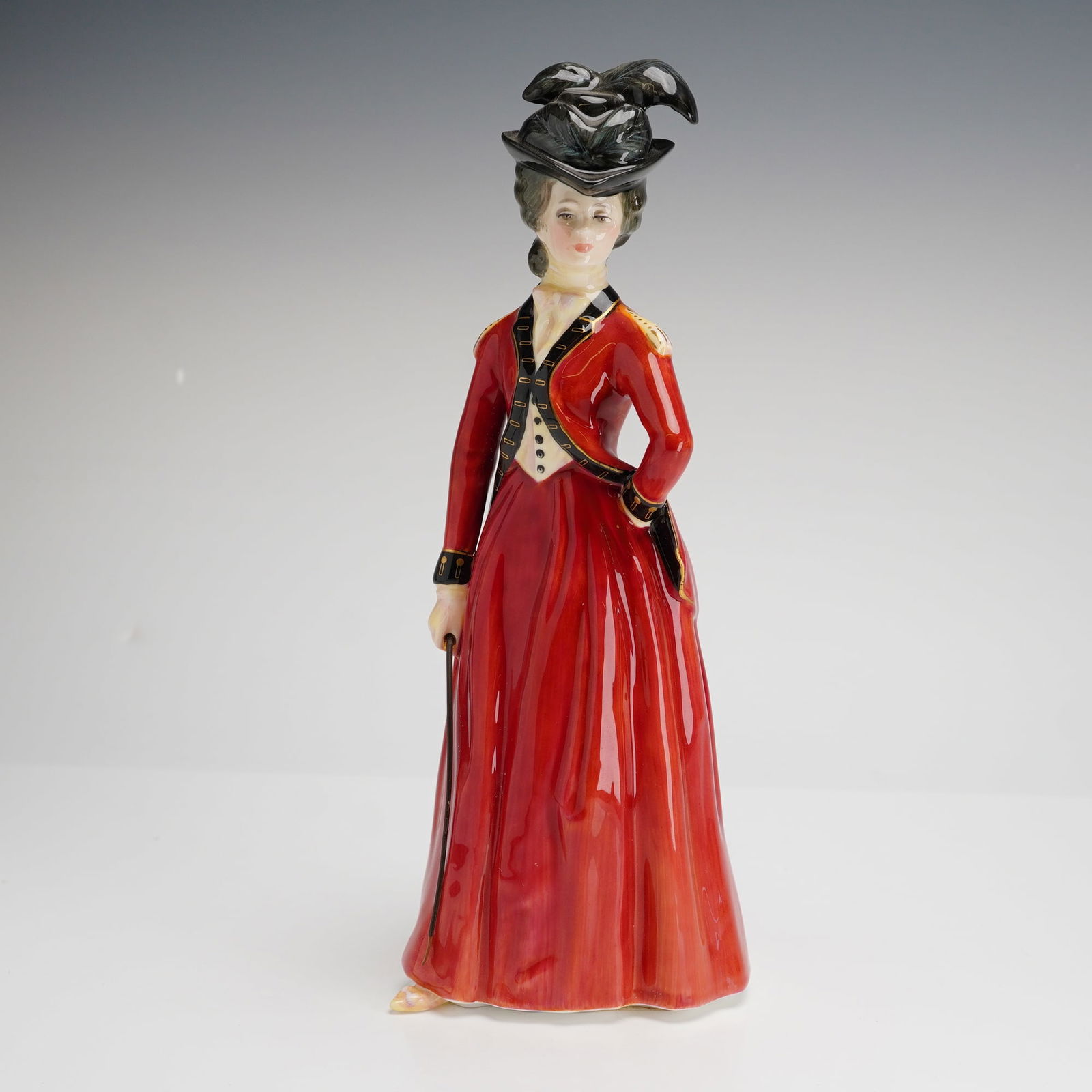 Royal Doulton Figurine, Lady Worsley HN3318: Royal Doulton fine bone china figurine titled Lady Worsley, model number HN3318. The hand-painted figure is depicted in an 18th-century style red riding habit with black and gold detailing, wearing a