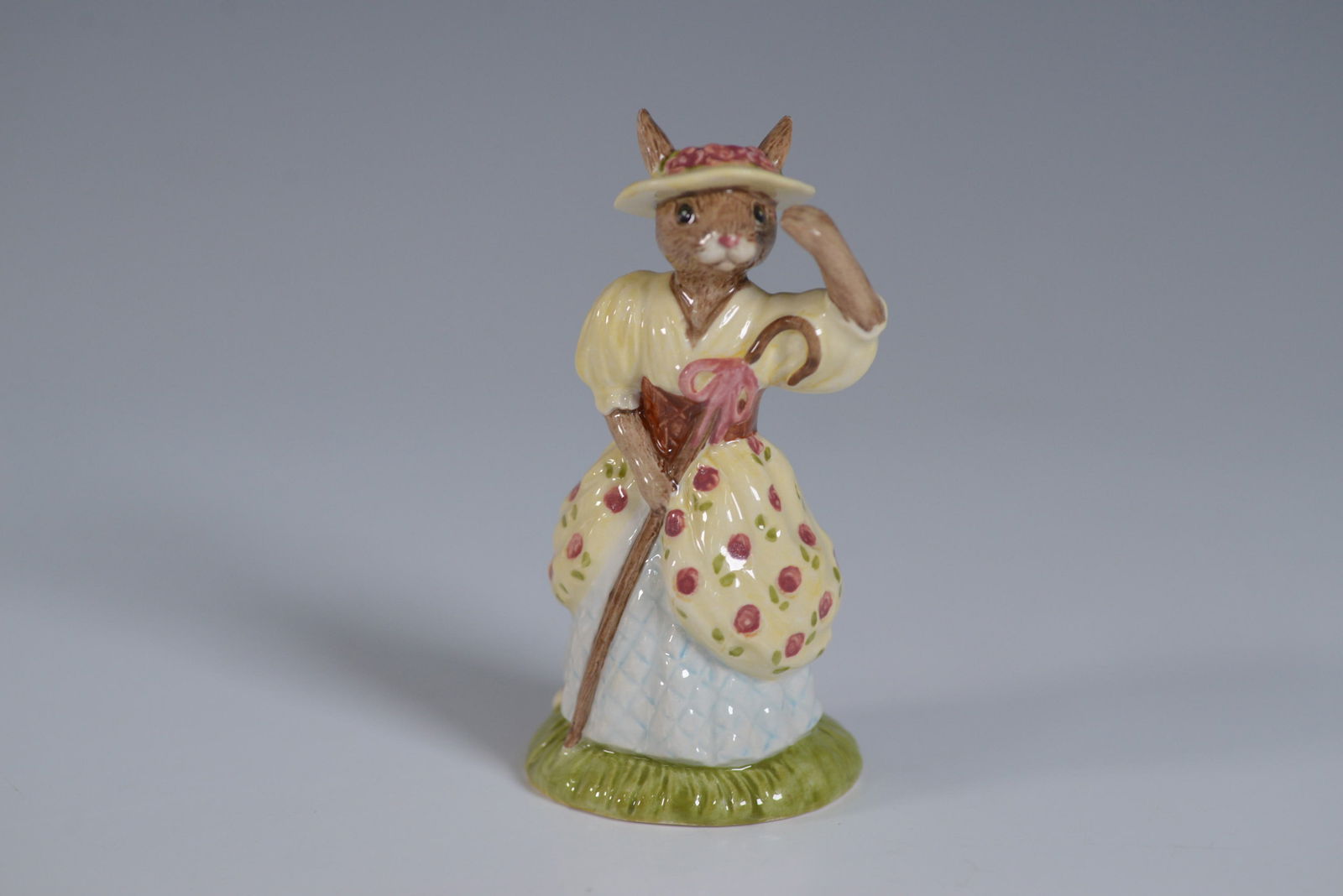 Royal Doulton Bunnykins Figurine, Little Bo Peep HN220: This charming Royal Doulton Bunnykins Little Bo Peep figurine DB 220 is part of the Nursery Rhyme Collection, released in 2000. Featuring a finely crafted porcelain bunny dressed as Little Bo Peep, sh