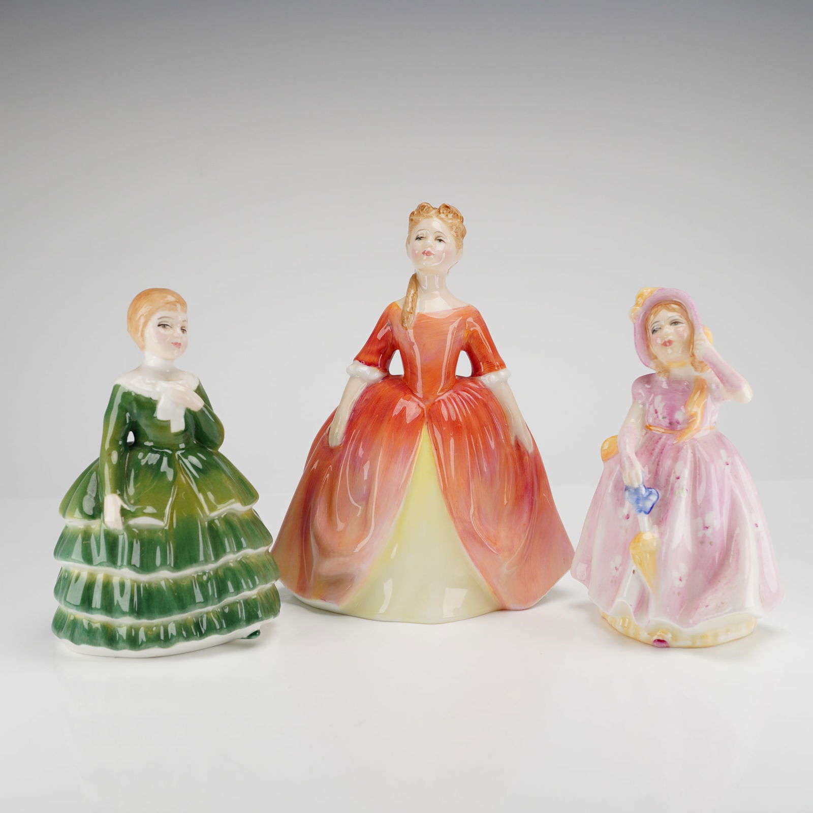 Three Royal Doulton Porcelain Figurines: Debbie, Babie, and Belle (1 of 3)