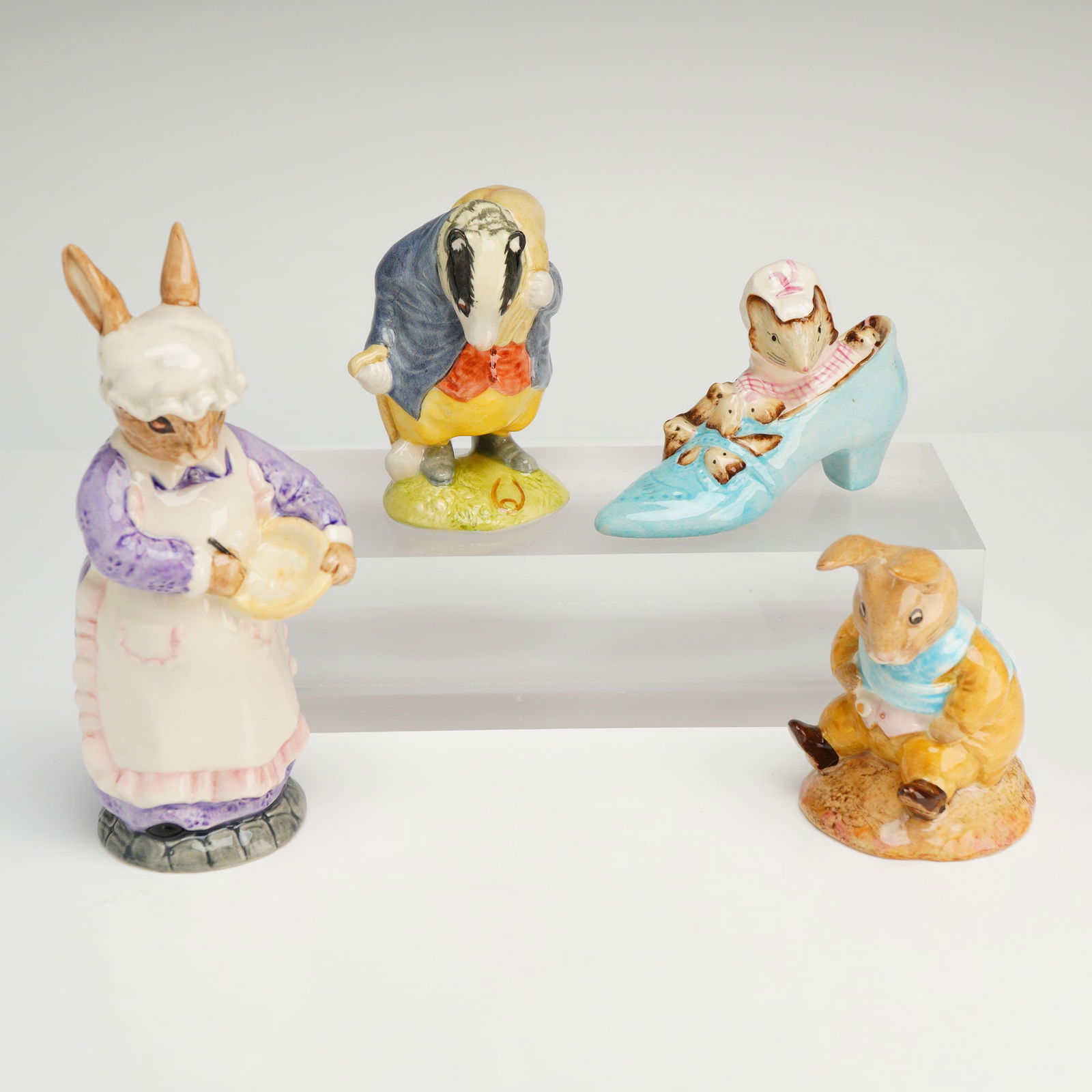 A Collection of Four Royal Albert and Beswick Figurines (1 of 3)