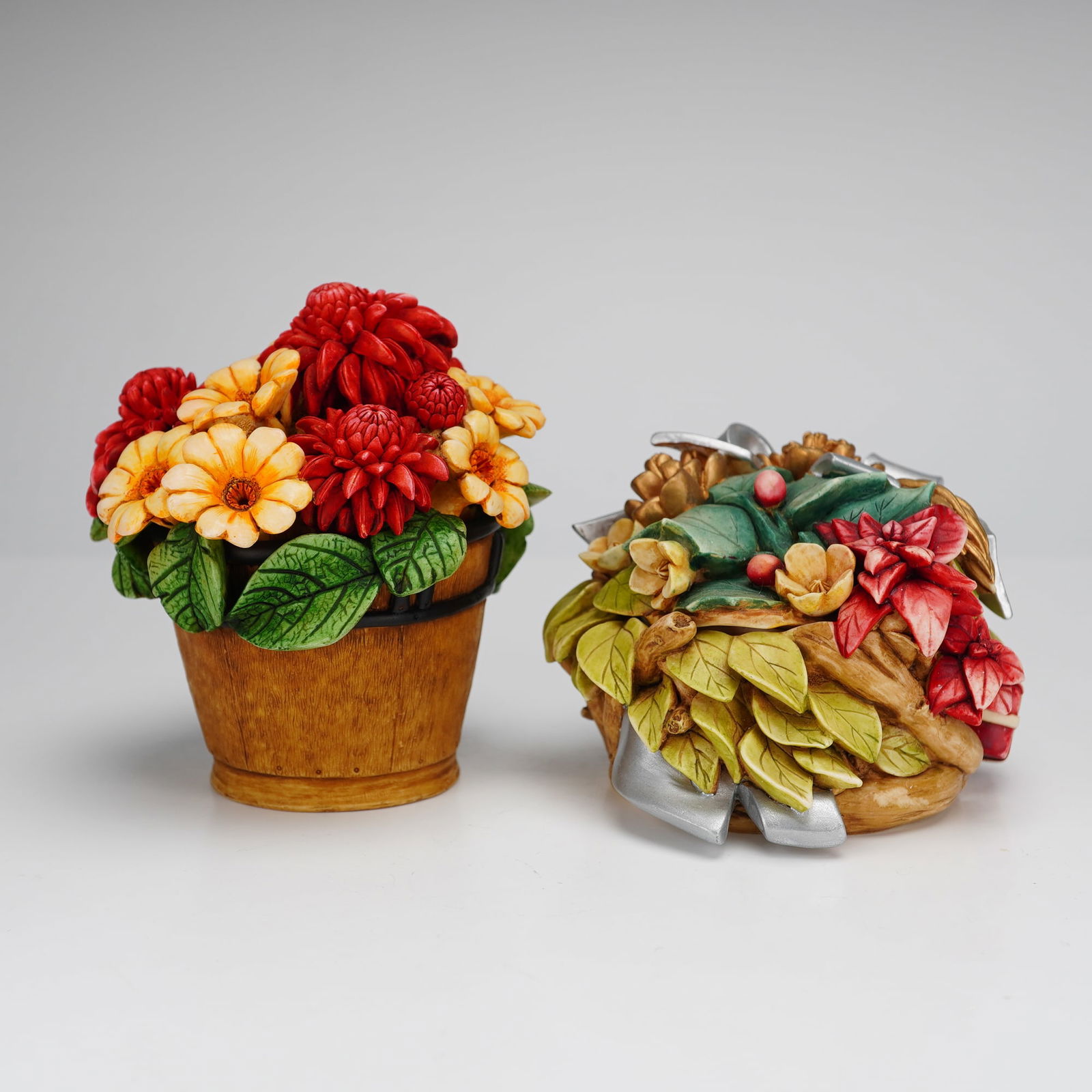 2pc Harmony Kingdom Harmony Garden Figurines: A pair of Harmony Kingdom Lord Byron's Harmony Garden figural marble resin trinket boxes, including Mother's Day Bouquet and Christmas Bouquet. Each piece is designed as a two-part box with a removabl