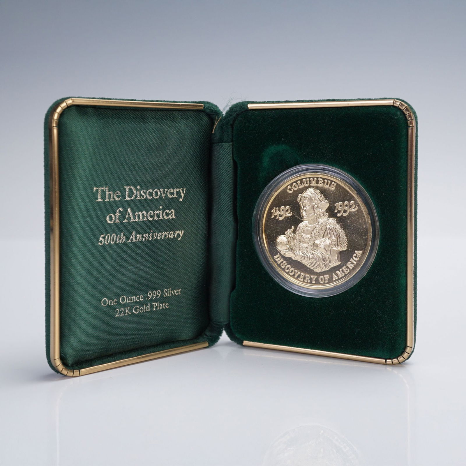 1992 Columbus 500th Anniversary The Discovery of America, 22k Gold Plated: Commemorative, non-circulating silver medal issued for the 500th anniversary of Columbus's 1492 voyage. Struck in one troy ounce of .999 fine silver with 22K gold plate and housed in its original gree