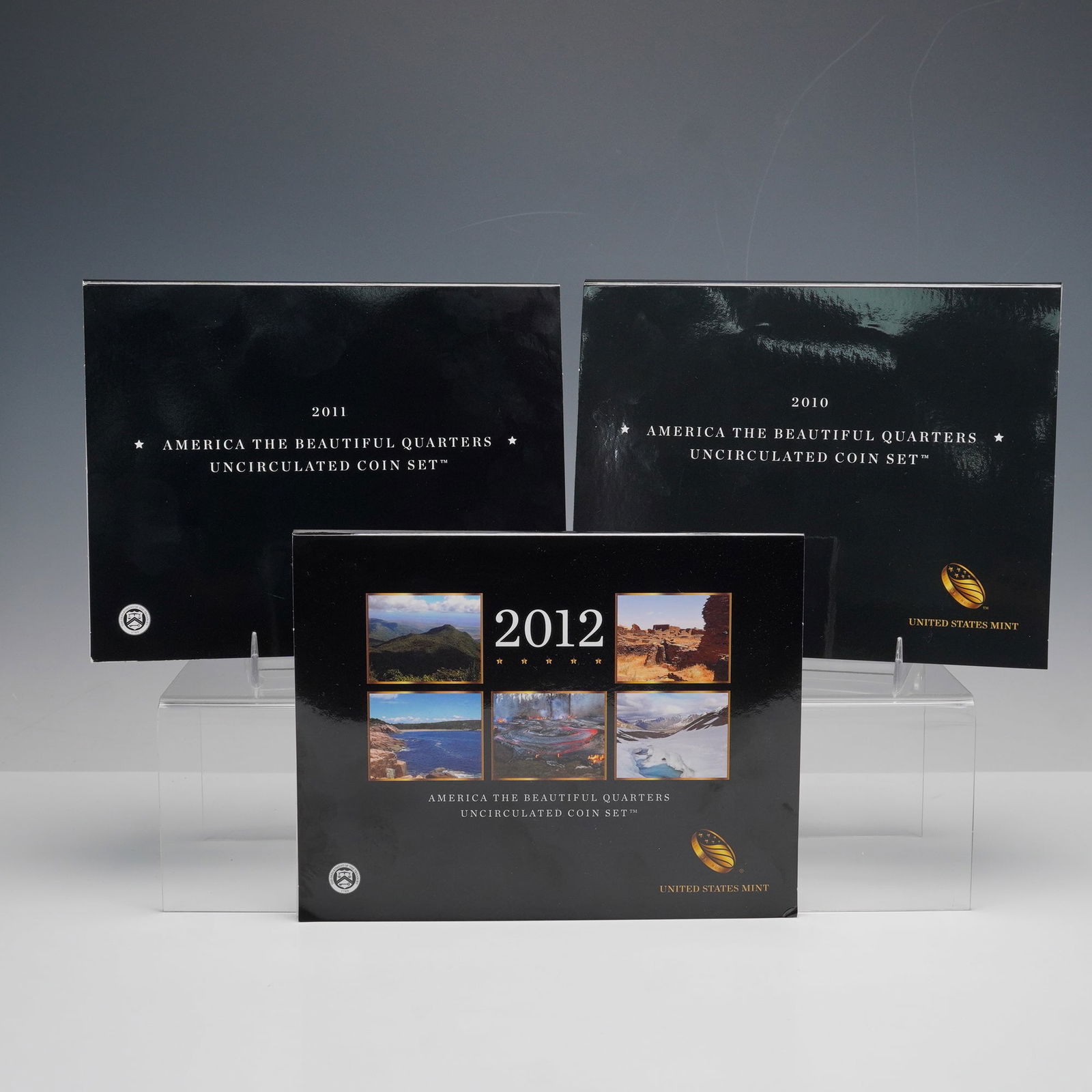 3pc 2010, 2011, 2012 America The Beautiful Quarters 10 Coin Sets: Group of three United States Mint America The Beautiful Quarters uncirculated coin sets from 2010, 2011, and 2012. Each set includes ten coins, with strikes from both the Denver and Philadelphia mints
