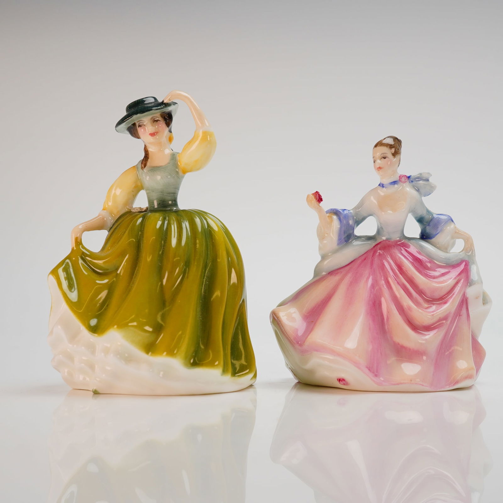 A Pair of Royal Doulton Bone China Figurines, Buttercup and Rebecca (1 of 3)