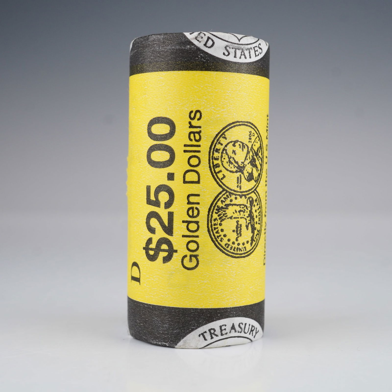 2006-D Sacagawea Golden Dollar Roll: U.S. Mint roll of 2006 Sacagawea Golden Dollars. The obverse depicts Sacagawea carrying her infant son, Jean Baptiste, with inscriptions LIBERTY and IN GOD WE TRUST. The reverse shows an eagle in