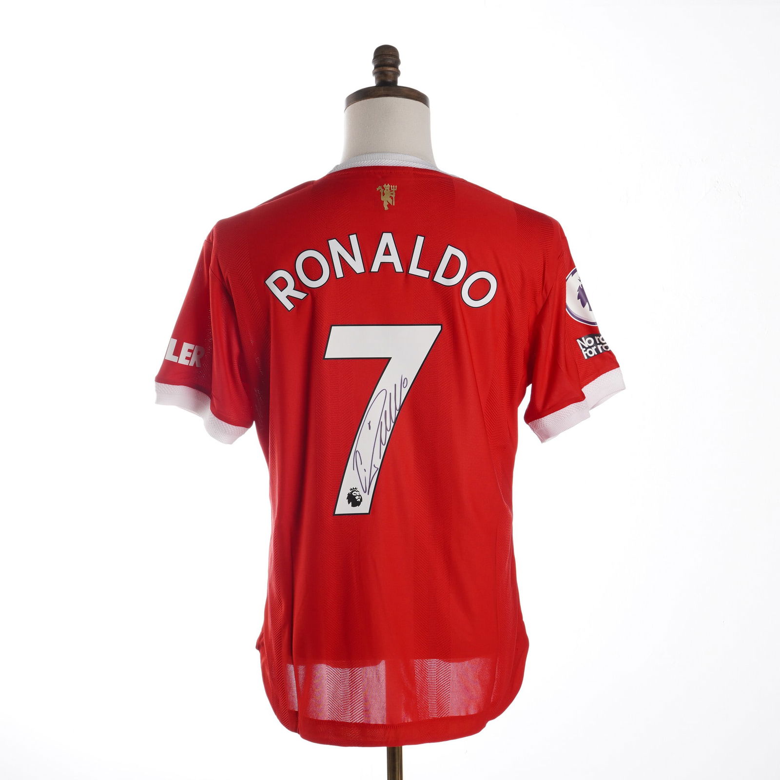 Cristiano Ronaldo Signed Manchester United 2021-2022 Home Jersey w/ COA: An authentic Manchester United 2021-2022 home jersey manufactured by Adidas, featuring the autograph of Cristiano Ronaldo. The red shirt displays the club crest and TeamViewer sponsor logo on the