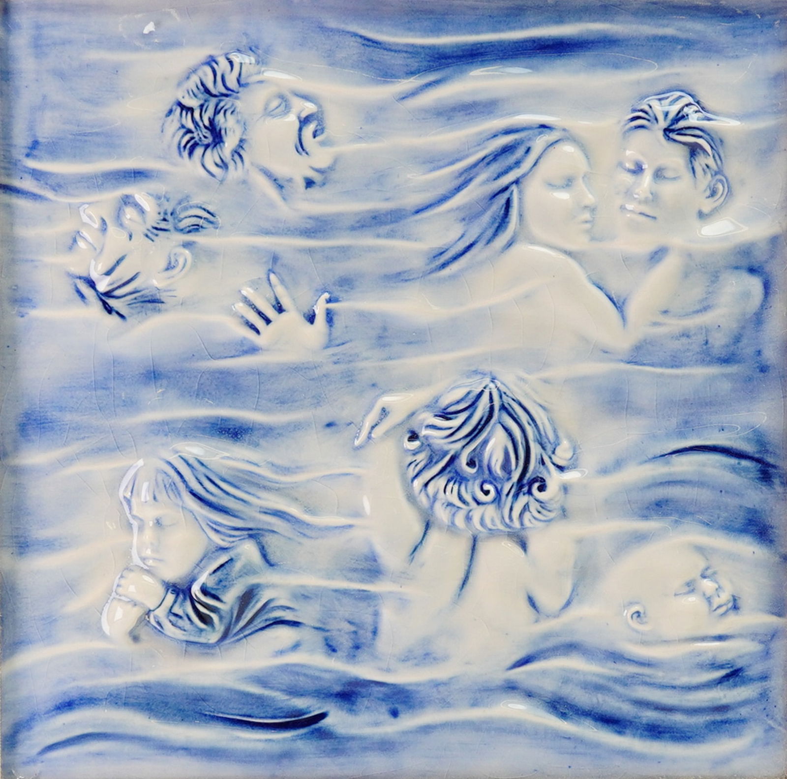 Framed Rare Moorcroft Pottery Swimming Plaque: Rare tile colored in blue and white of men, women and children faces in ocean waves. Moorcroft impressed mark on reverse. Dimensions13"L x 13"H Manufacturer or BrandMoorcroft Country of OriginEngland