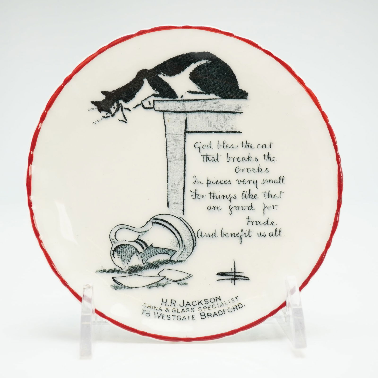 Royal Doulton by David Henry Souter Series Ware Plate, Kateroo: Royal Doulton by David Henry Souter Series Ware Plate, Kateroo. A white porcelain plate with a red rim, features a black and white cat on top of a table, peering down at the broken jug below. The insc