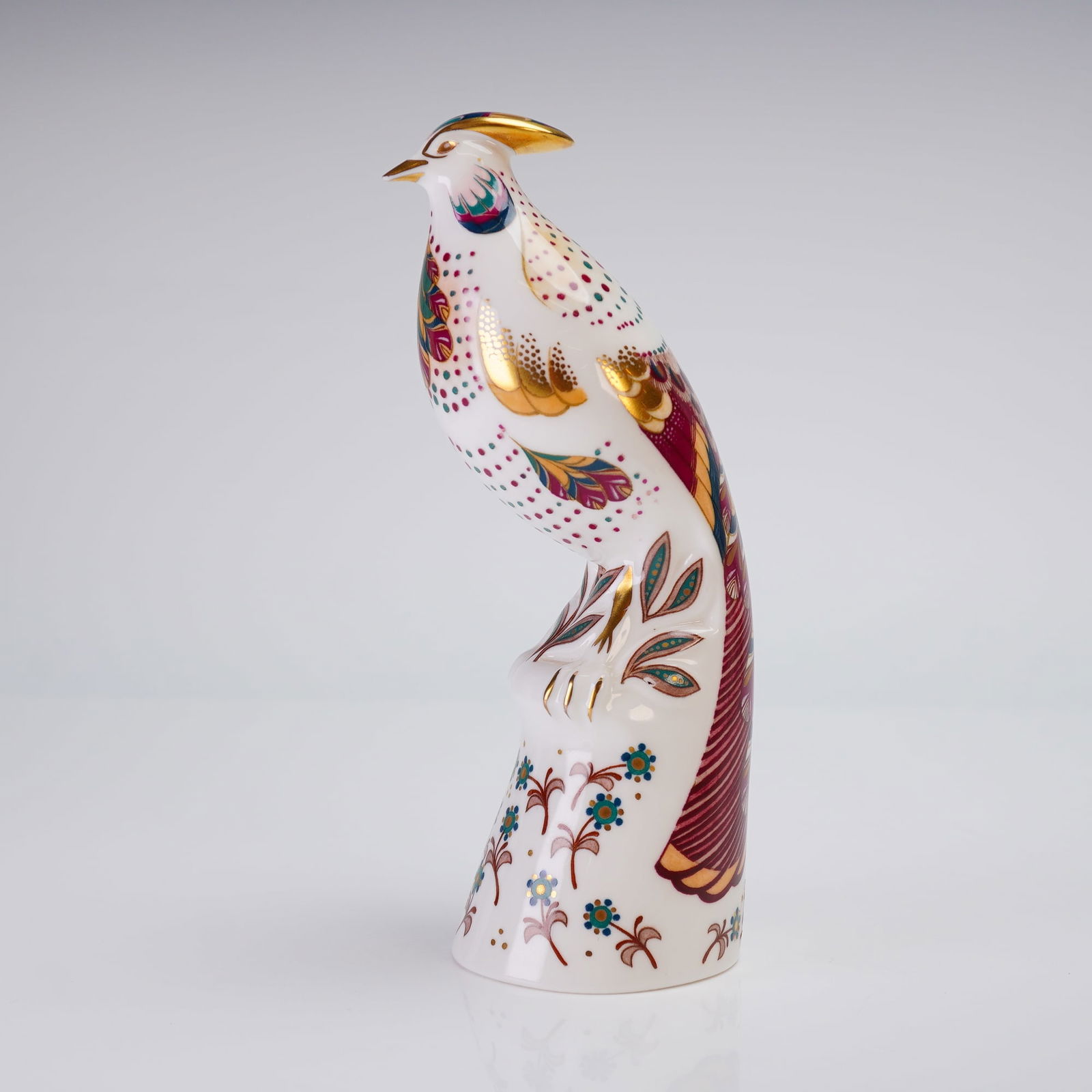 Minton Flights of Fantasy Figurine, Marua: A single Minton bone china figurine, model 'Marua', from the 'Flights of Fantasy' series, designed by John Ablitt and dated 1993. The highly stylized game bird or pheasant is executed in fine bone chi