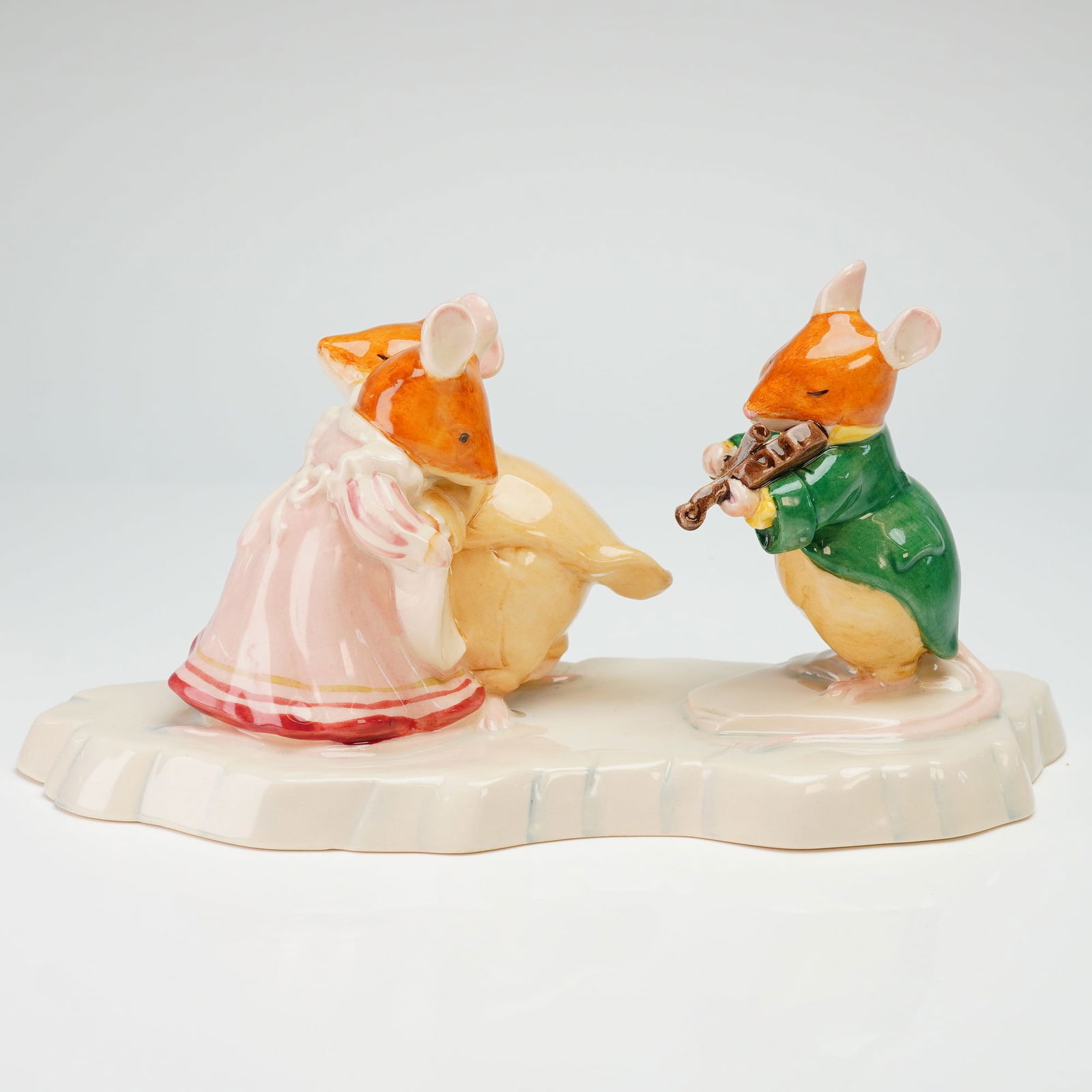 Brambly Hedge by Royal Doulton Figurine, The Ice Ball DBH30: This limited edition, hand-made and hand-decorated piece produced in England depicts three anthropomorphic mice on a pale, textured base designed to resemble ice. The composition features one mouse pl