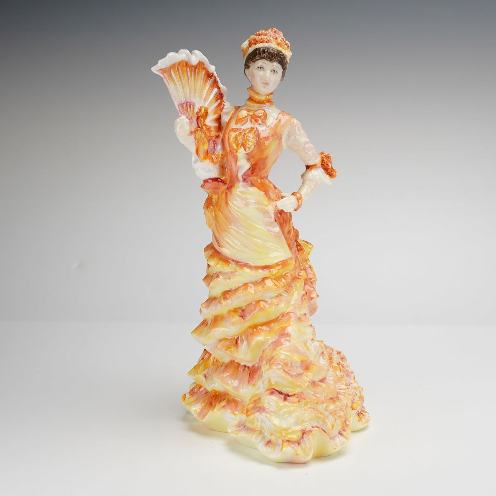 Royal Doulton Figurine, Le Bal HN3702: This Royal Doulton bone china figurine, titled Le Bal HN3702, is inspired by a painting by James Tissot and was produced as a limited edition of 5,000, with this specific piece marked as number 354. T