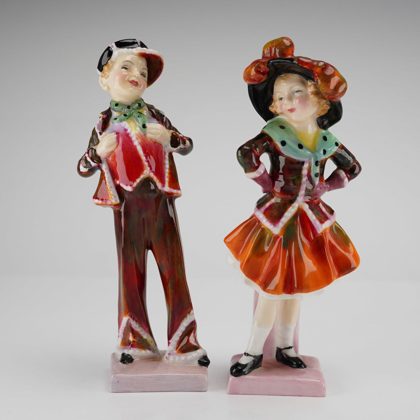 A Pair of Royal Doulton Pearly Boy and Girl Figurines (1 of 3)