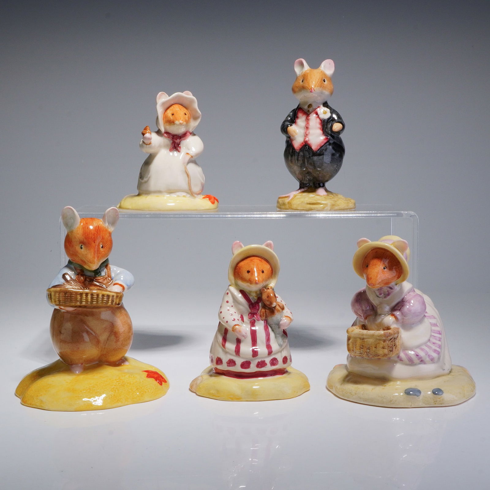 5pc Royal Doulton Brambly Hedge Figurines - DBH6, 39, 40, 42 & 43: A collection of five Royal Doulton glazed porcelain figurines from the Brambly Hedge series. This group features anthropomorphic mouse characters in period-style attire, including Mr. Saltapple DBH39,