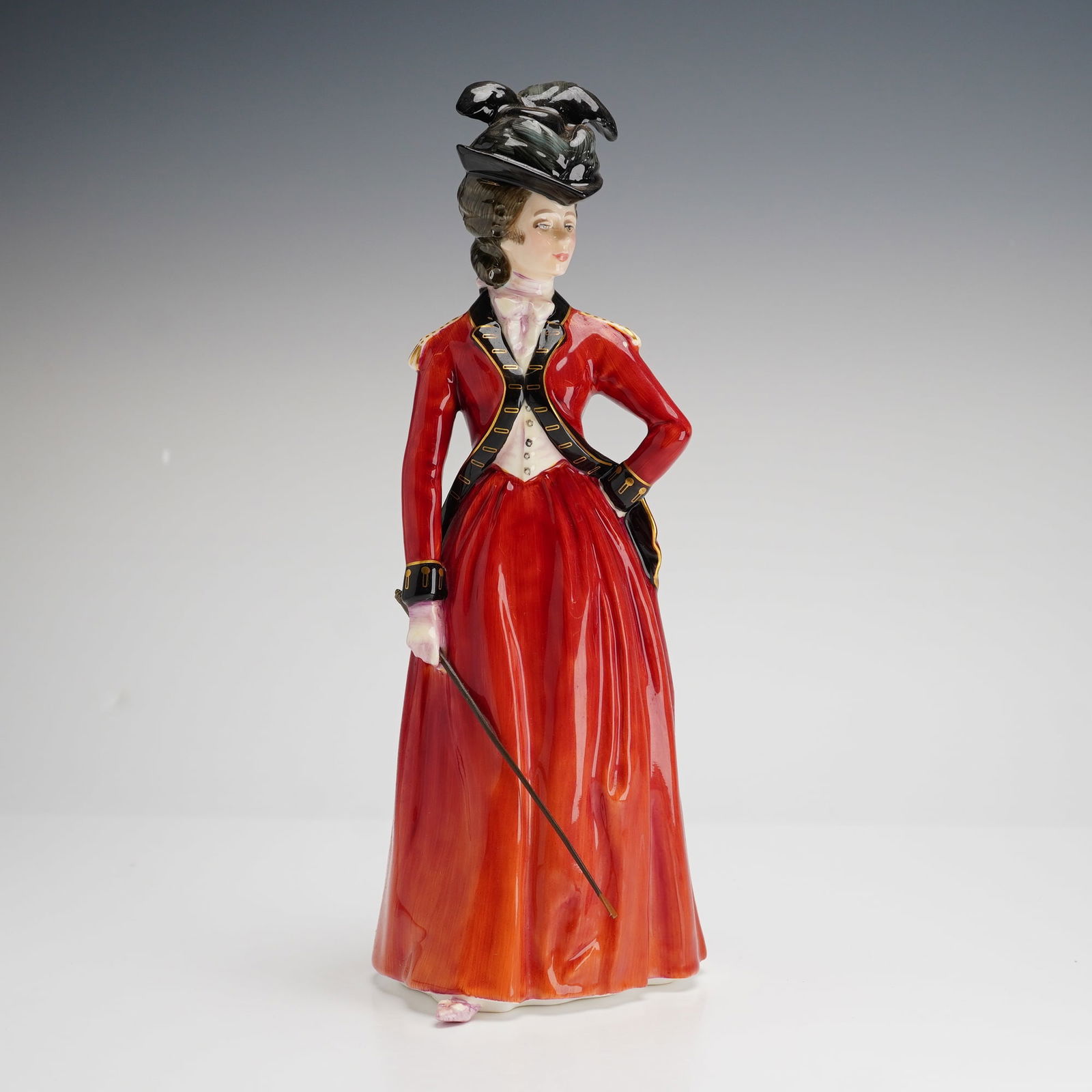 Royal Doulton Figurine, Lady Worsley HN3318: Royal Doulton fine bone china figurine titled Lady Worsley, model number HN3318. The hand-painted figure is depicted in an 18th-century style red riding habit with black and gold detailing, wearing a